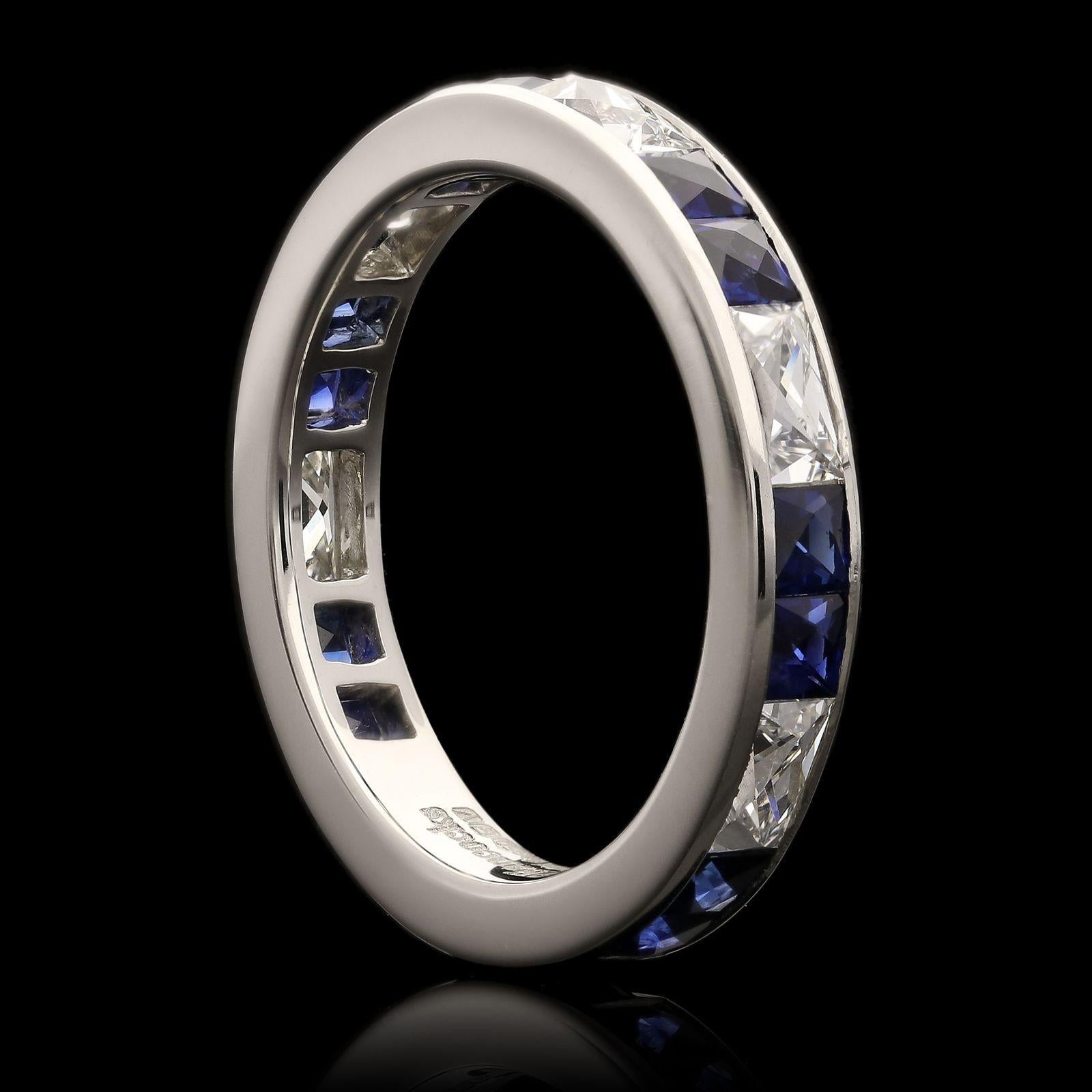 A beautiful and elegant French-cut diamond and sapphire eternity ring by Hancocks, set alternatively with one rectangular French cut diamond followed by two square French cut sapphires, all in a finely crafted platinum channel