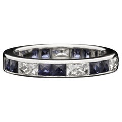 Hancocks Contemporary French Cut Diamond and Sapphire Eternity Ring in Platinum
