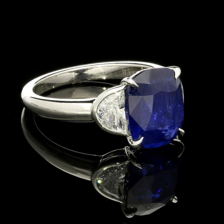 4.06ct Ceylon heated sapphire with GCS report 
0.62cts total of half moon cut diamonds with 0.05cts in the gallery
Platinum with maker's marks and London assay marks
UK finger size L, can be adjusted to your own finger size
6.7 grams

A beautiful