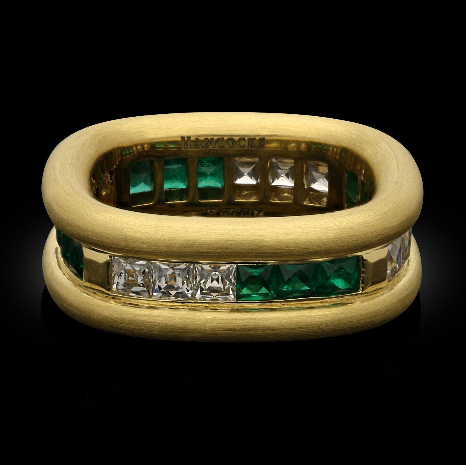 Maker:
Hancocks
Summary:
French Cut Diamond and Emerald 'Donut' Eternity Ring in 18ct Yellow Gold
Description:
A handcrafted diamond and emerald yellow gold 'Donut' eternity ring by Hancocks. The ring is a softly square shape and set with