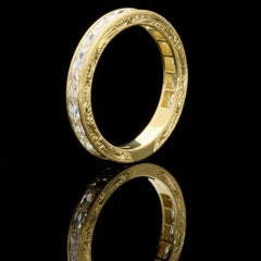 Anello di eternità "Est/Ovest" con diamante taglio francese Hancocks Finemente inciso in oro
