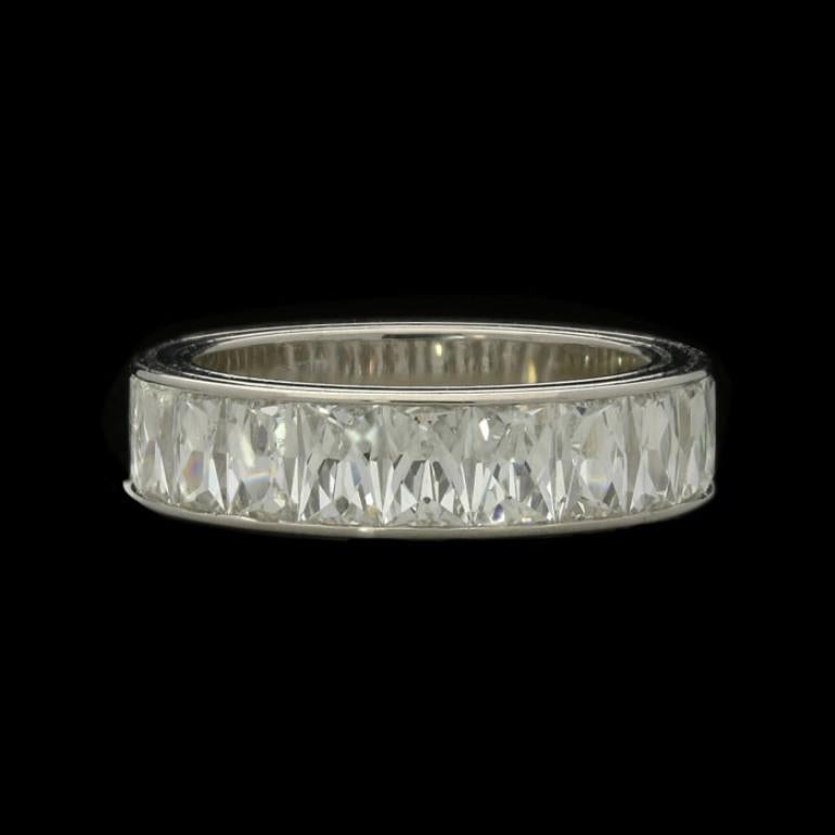 13 x rectangular French-cut diamonds G/H VS 3.67cts total weight
Platinum with makers mark and London assay marks
UK finger size M, US size 6.5, can be adjusted to your own finger size
10.1 grams

A stunning diamond and platinum half eternity ring