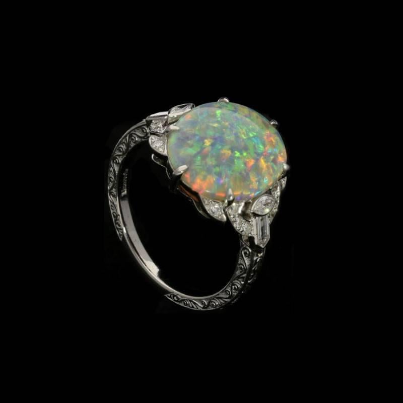 Oval Cut Hancocks Opal and Diamond Ring Set in Platinum with Diamond Shoulders For Sale