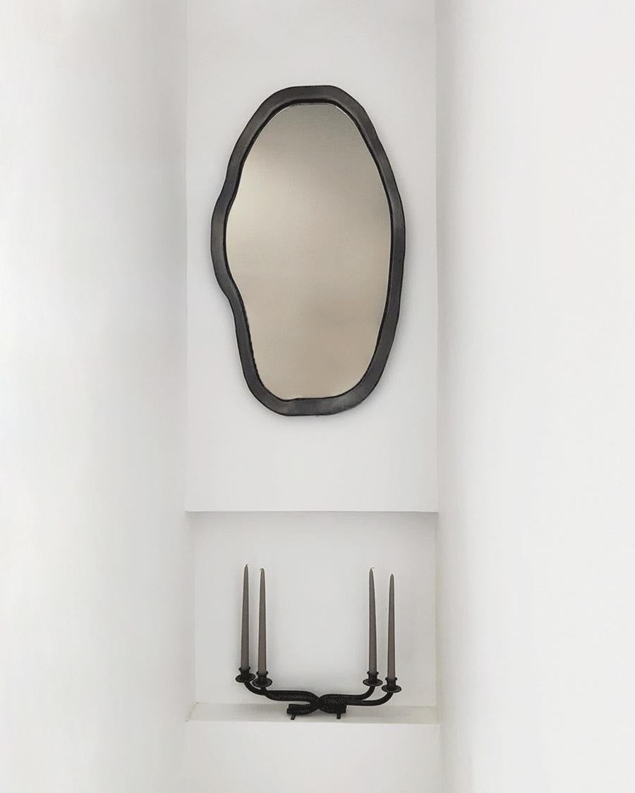 HAND 1.23 is the first work in a continuous design anthology merging particular forms, finish and function. Hand tooled and finished, this wall mirror has been fully conceived during the actual crafting. Direct from the artist's studio, each HAND