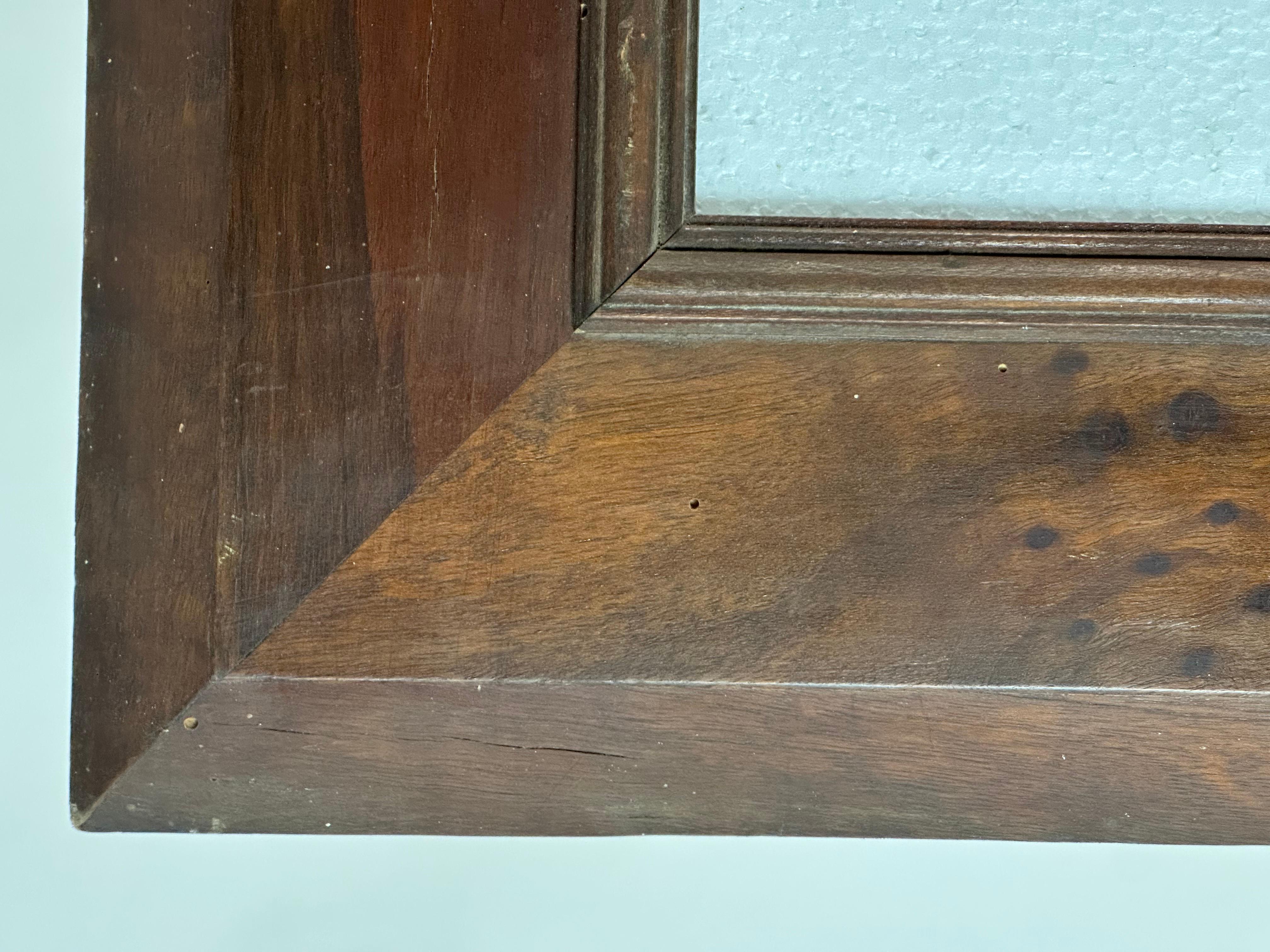 Veneer Hand-aged Antique Wall Mirror with 19th Century Spanish Academic Frame For Sale