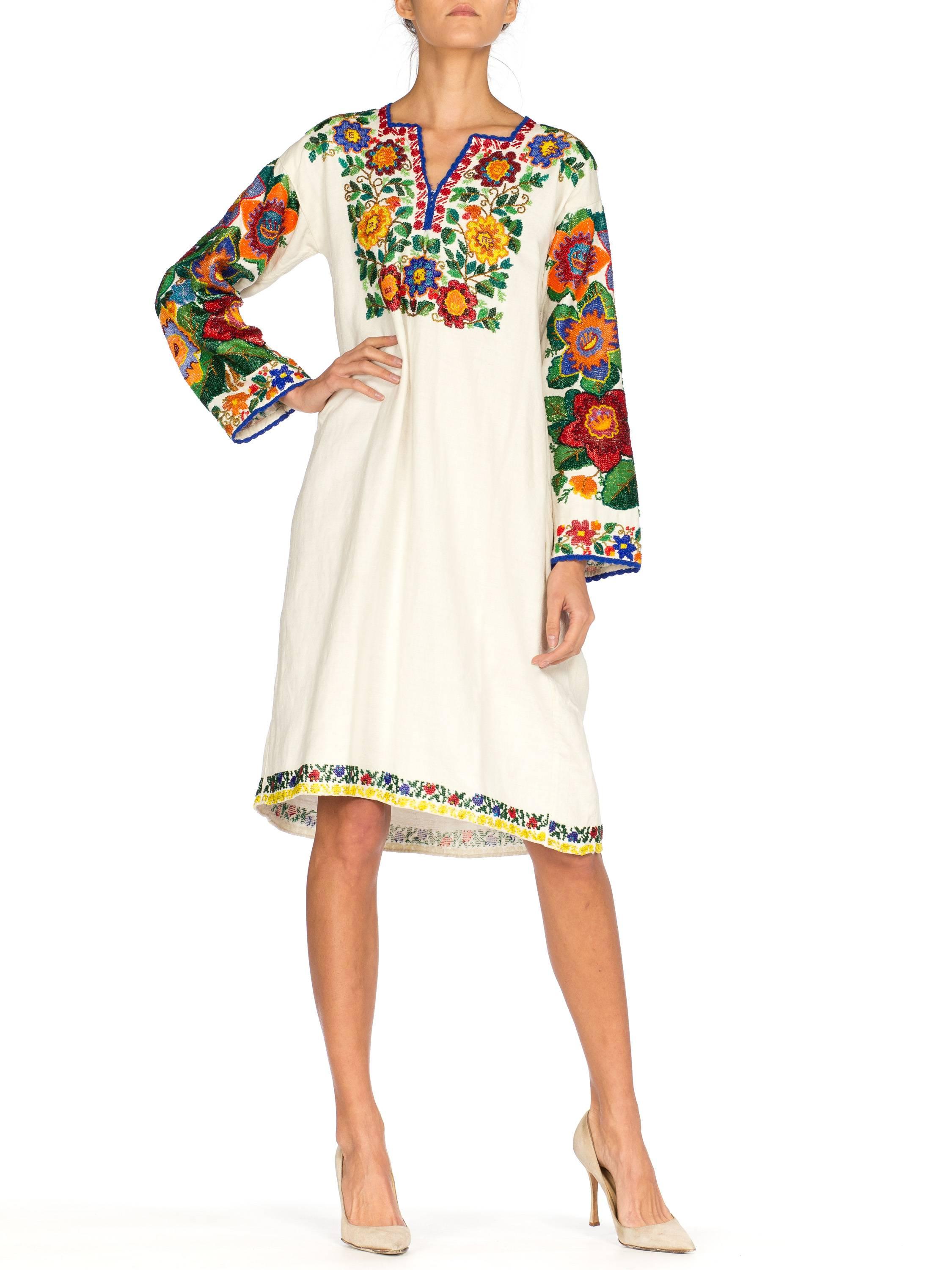 1910S Ecru Linen Antique Folk Tunic Dress With Heavy Multicolored Beading In Excellent Condition In New York, NY