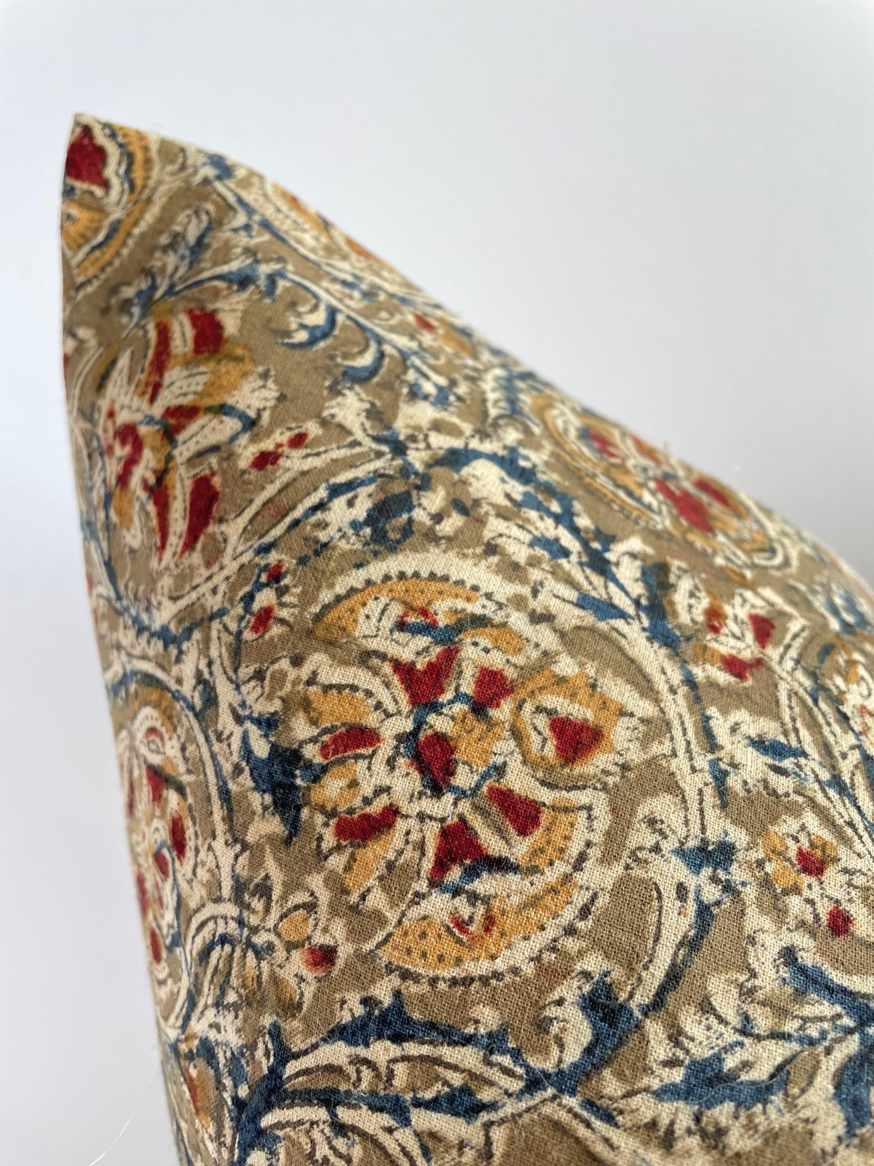 Beautifully hand block-printed pillow on cotton/ linen fabric. Featuring a floral pattern in the color olive. Linen back. 
Care Instructions: Dry clean recommended. Includes insert. 
Size: 22” x 22” 
Colors: Blue, gold, rust, flax, olive, khaki.