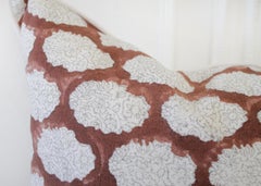 Hand Blocked Gray and Rust Color Accent Pillow on White Linen Background