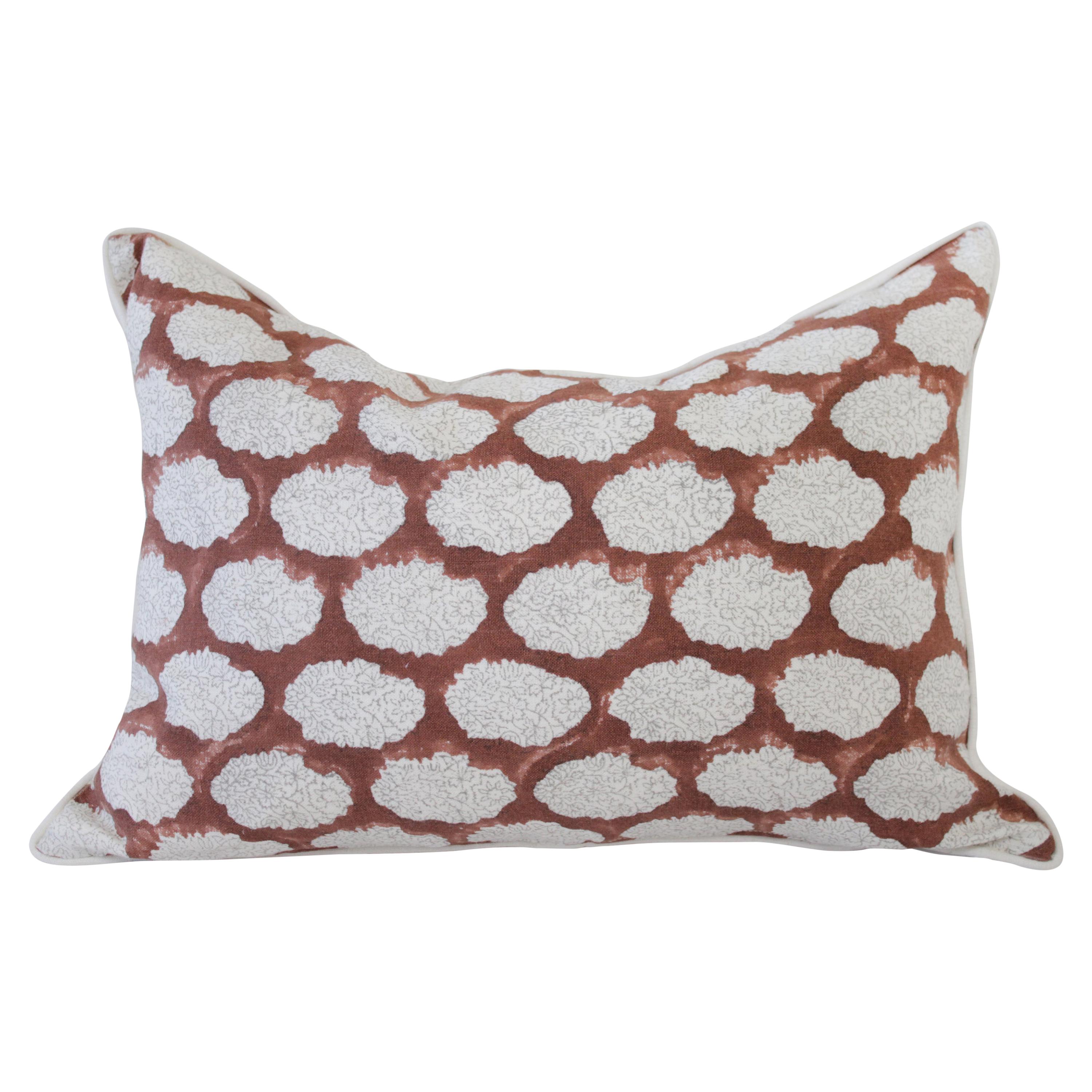 Hand Blocked Gray and Rust Color Accent Pillow on White Linen Background