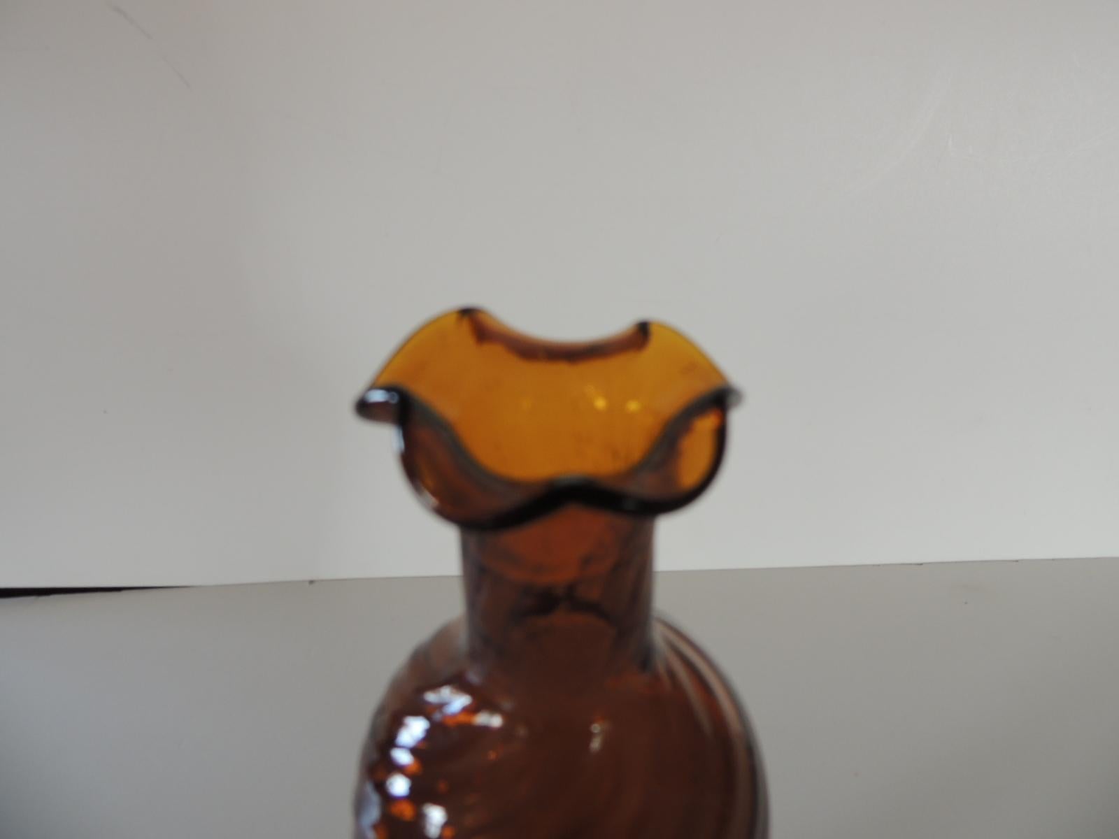 Hand blown Amber bud vase
Size: 3