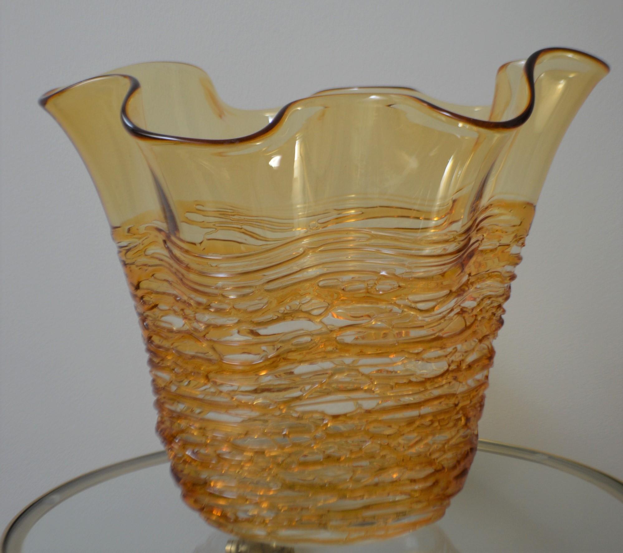 One of a kind hand blown decorative Murano glass vase with intricate glass work forming a lace effect. 
The color of the glass is gold and changing in intensity according to the light. Measures: Height 12 1/2