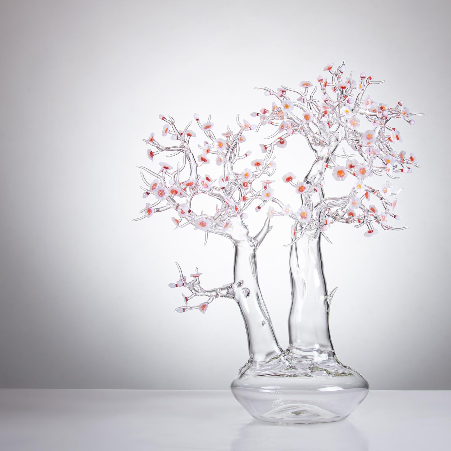 Hand blown glass sculpture representing a bonsai tree in blossom.

Artist: Simone Crestani
Material: borosilicate glass
Technique: flameworking
Unique piece
Year: 2019
Measures: Height 23.2”, width 18.1