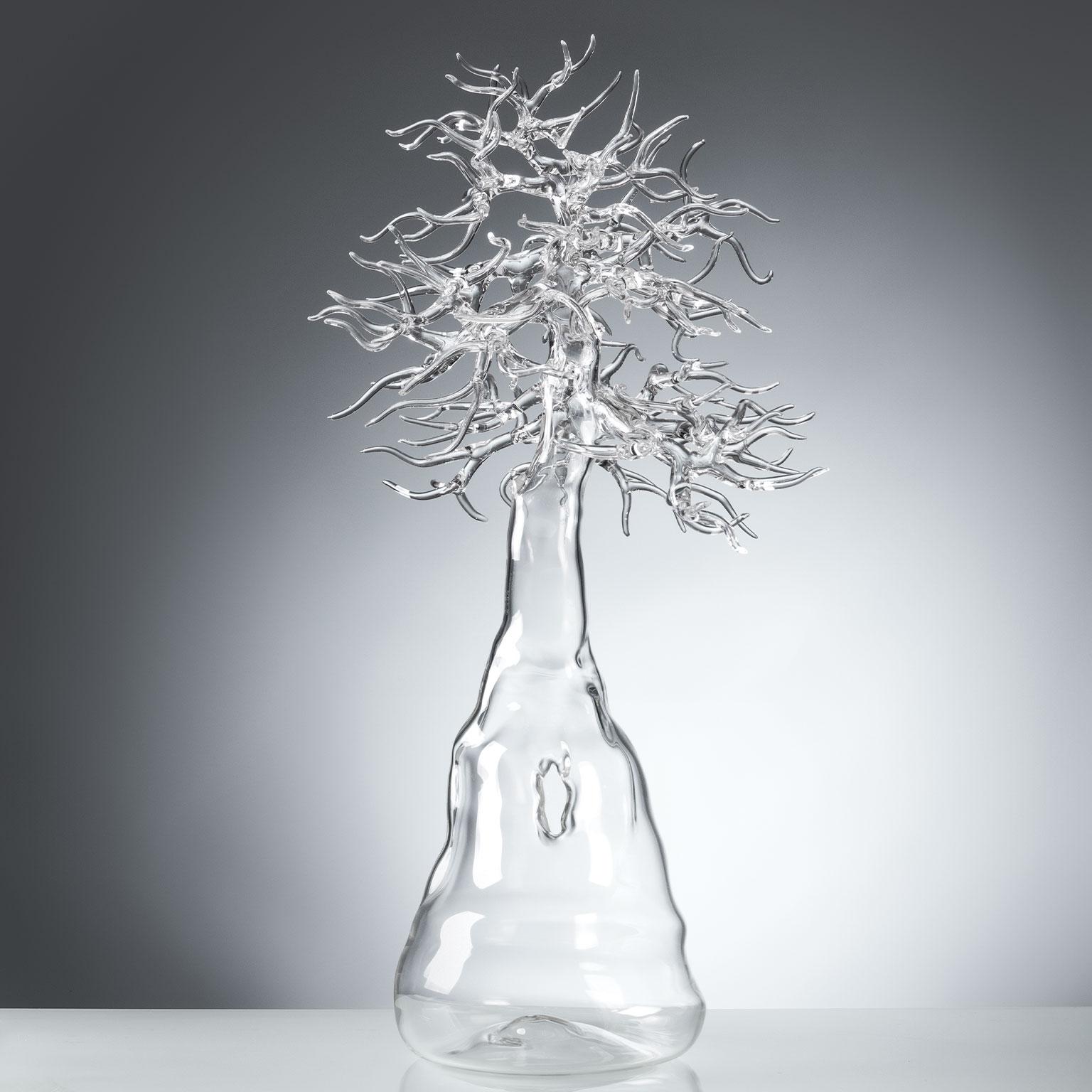 Hand blown glass sculpture representing a bonsai tree.

Artist: Simone Crestani
Material: Borosilicate glass
Technique: Flameworking
Unique piece
Year: 2017
Measures: Height 20.4”, width 9.8”, depth 10.6”.
Signed and dated on the trunk.
