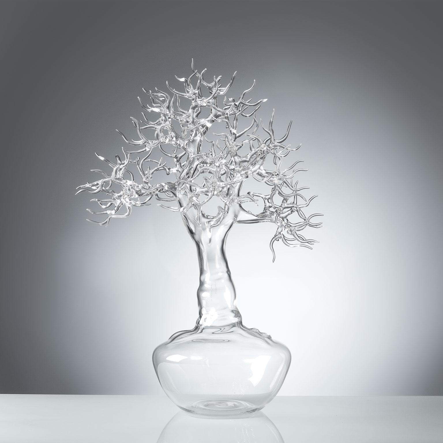 Hand blown glass sculpture representing a bonsai tree.

Artist: Simone Crestani
Material: borosilicate glass
Technique: flame working
Unique piece
Year: 2017
Measures: Height 20.8”, width 11.8”, depth 14.3”.
Signed and dated on the trunk.