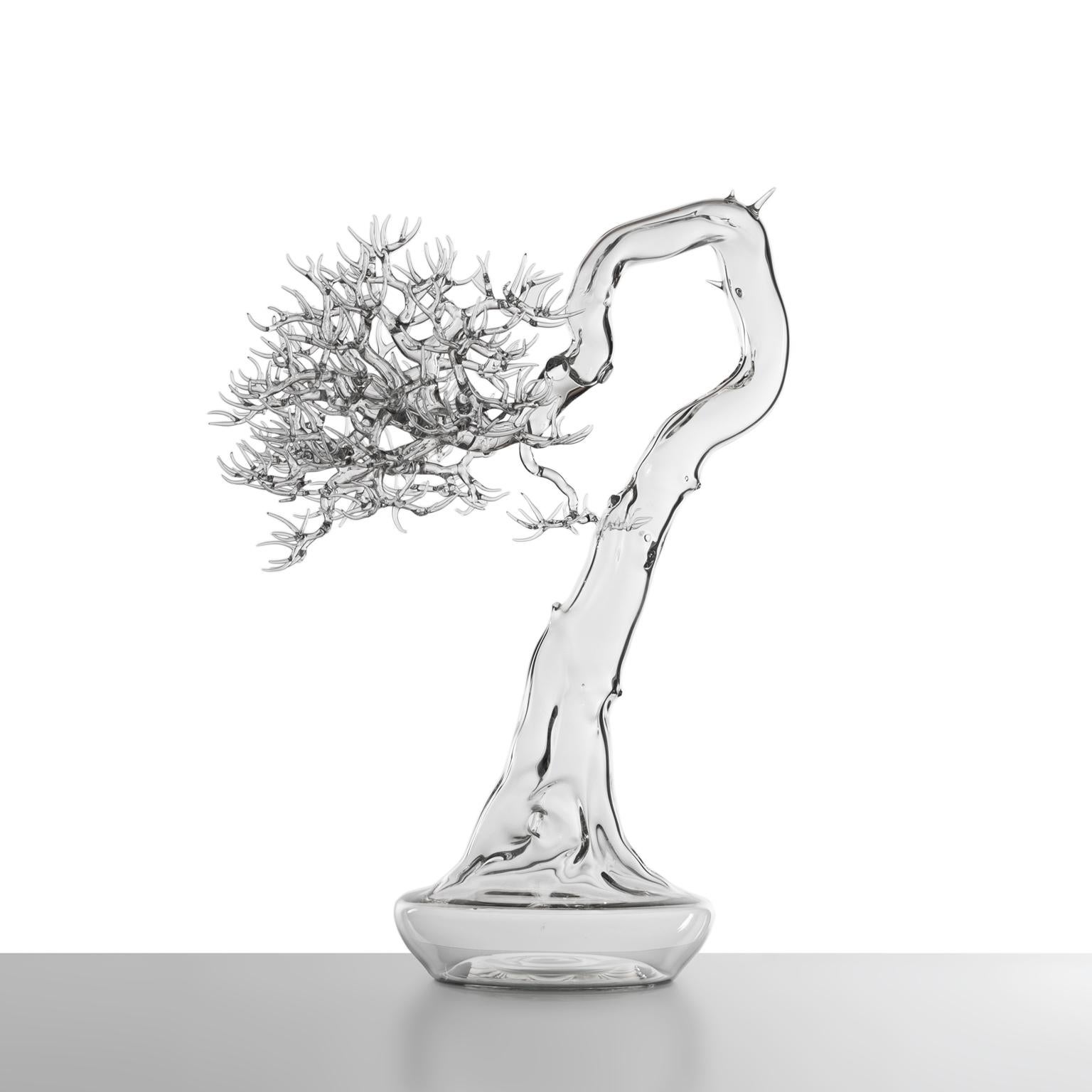 Hand-blown glass sculpture representing a bonsai tree.

Artist: Simone Crestani
Material: Borosilicate glass
Technique: Flameworking
Unique piece
Year: 2021
Measures: Height 22.04'', width 15.74'', depth 11.81'' in
Signed and dated on the