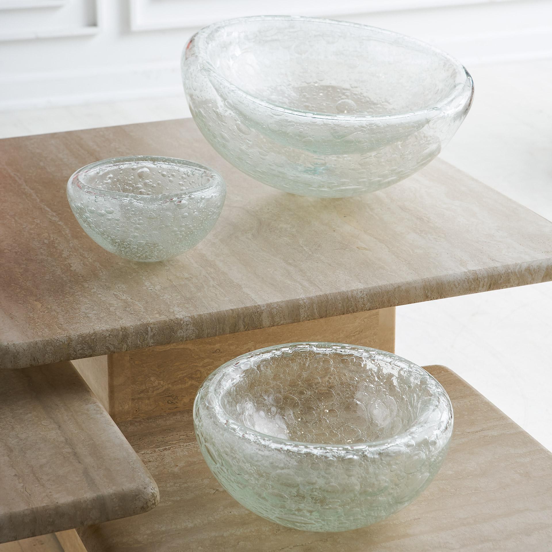 Wonderful hand blown glass bowls with delightful bubble effect. Sure to add a bit of delight to any tabletop. Each bowl is unique in overall shape and thickness.

Medium: Approx 9