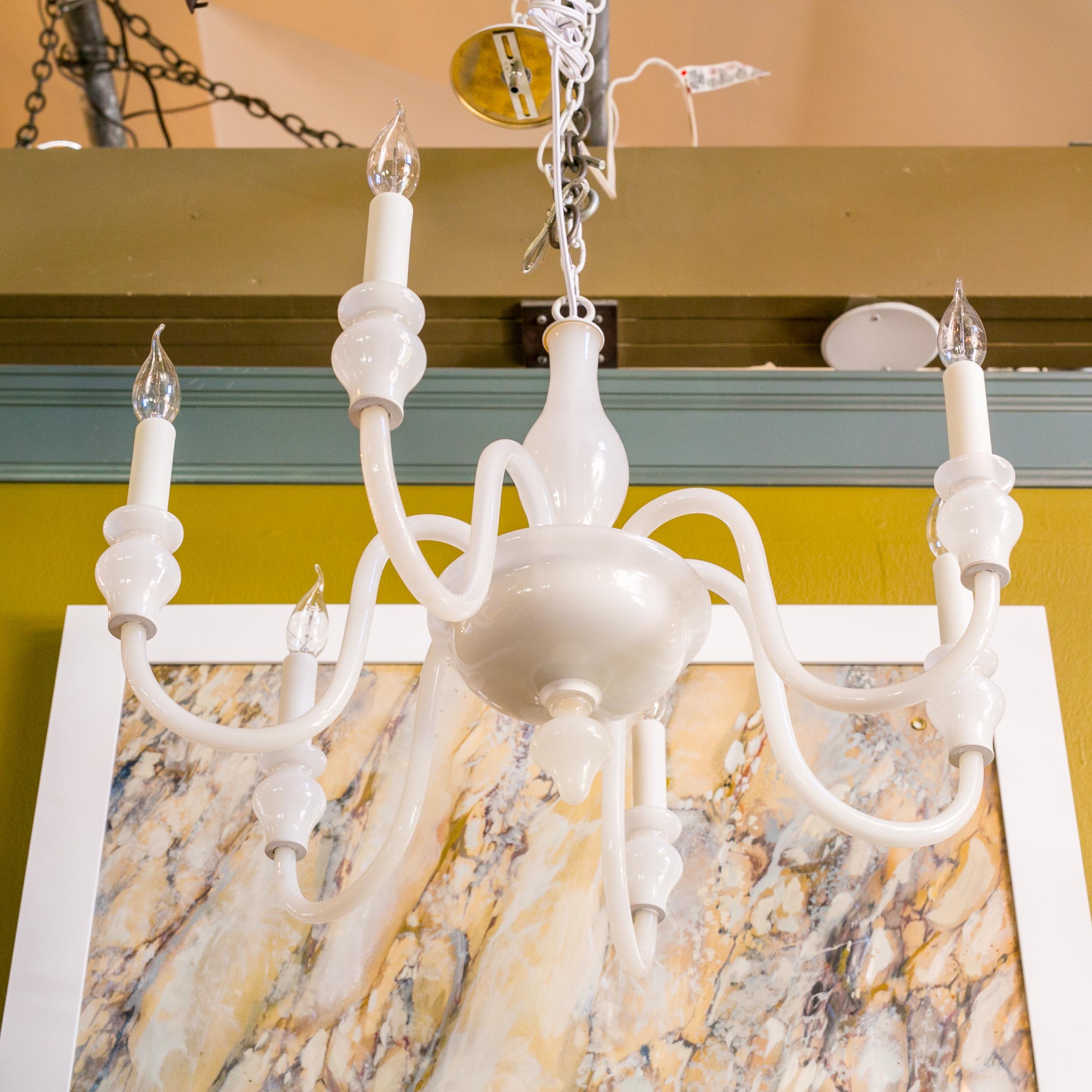 White glass Murano chandelier of interesting white milk glass. This light is interesting since I find so few which are all one color - much less completely simple white. The glass is a tiny bit more translucent than milk glass.

The chandelier has