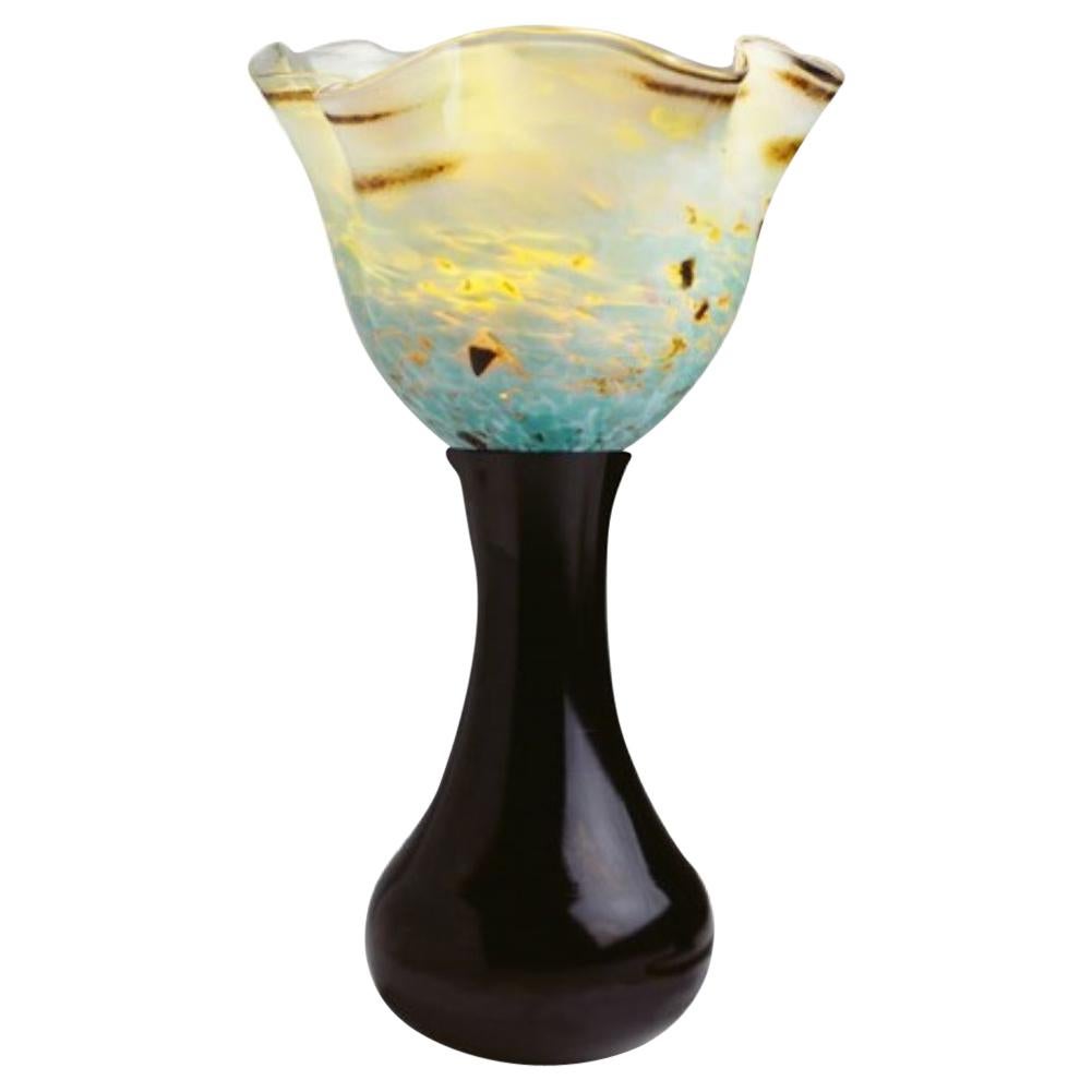 Blossom lamp
Hand blown glass table lamp with cast aluminum base
Signed by Designer Gregory Clark
Machined anodized aluminum
Touch sensitive switch
Hand blown art glass shade.


 