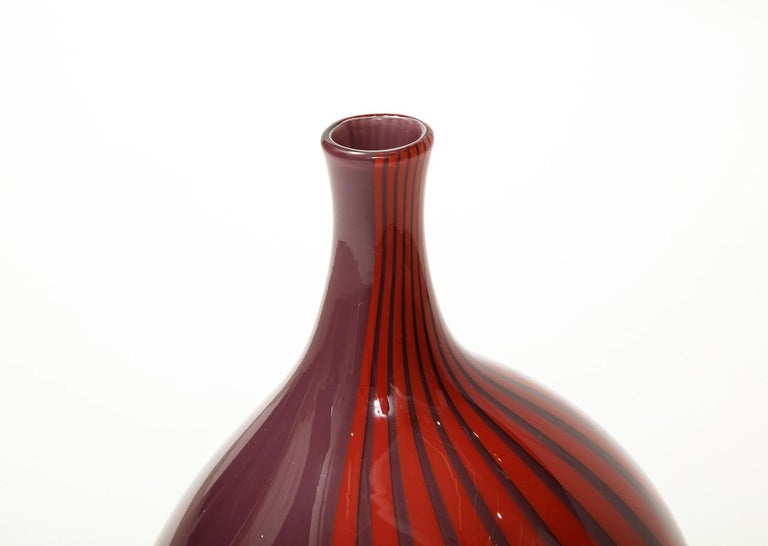 Hand blown, striped and solid Murano glass from the “Giano” series. Original label attached.