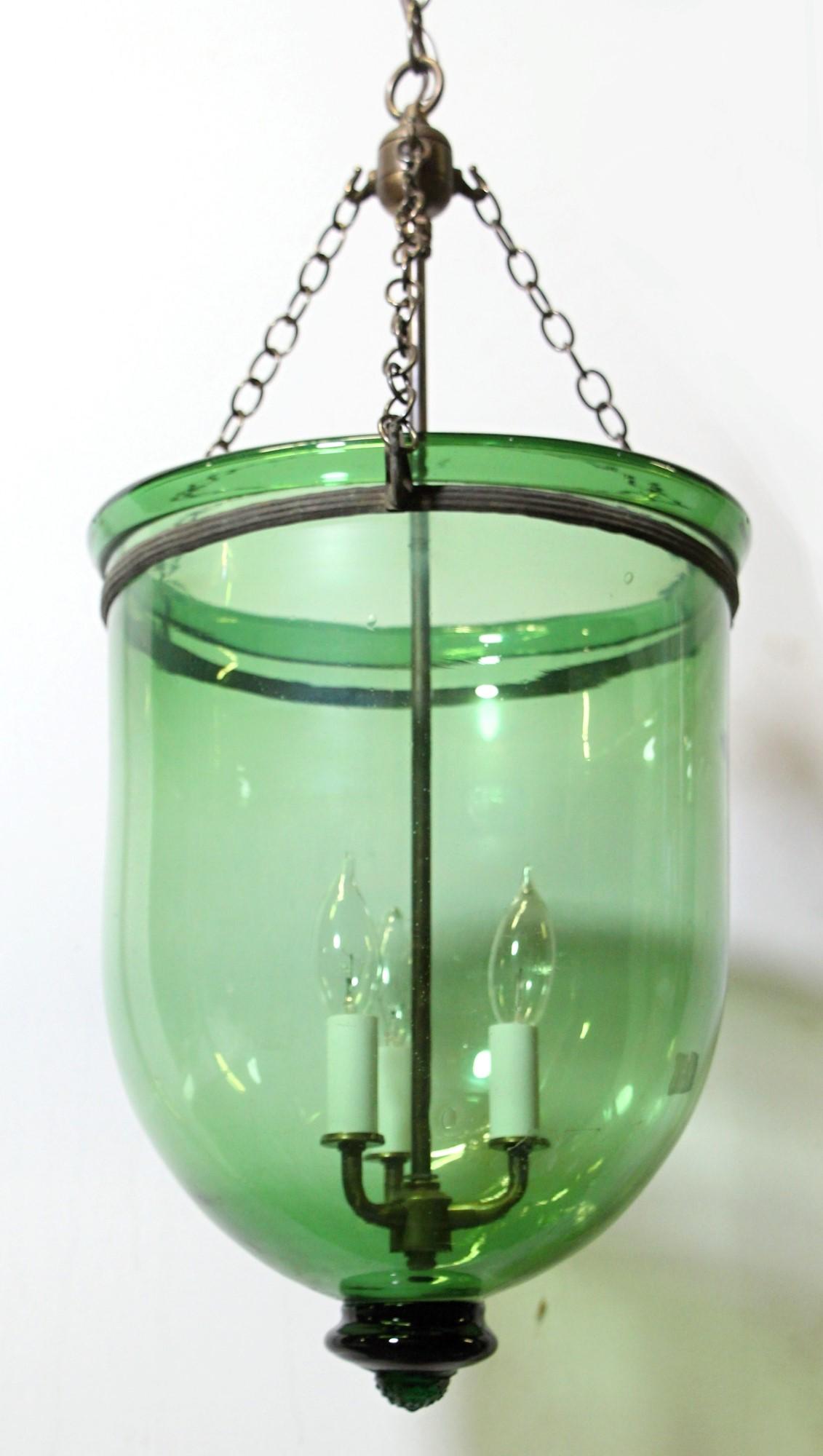 Antique early 20th Century original large scale hand made blown glass shade bell jar pendant light. Glass was cast with a green tint. Features new brass hardware. This can be seen at our 400 Gilligan St location in Scranton, PA.