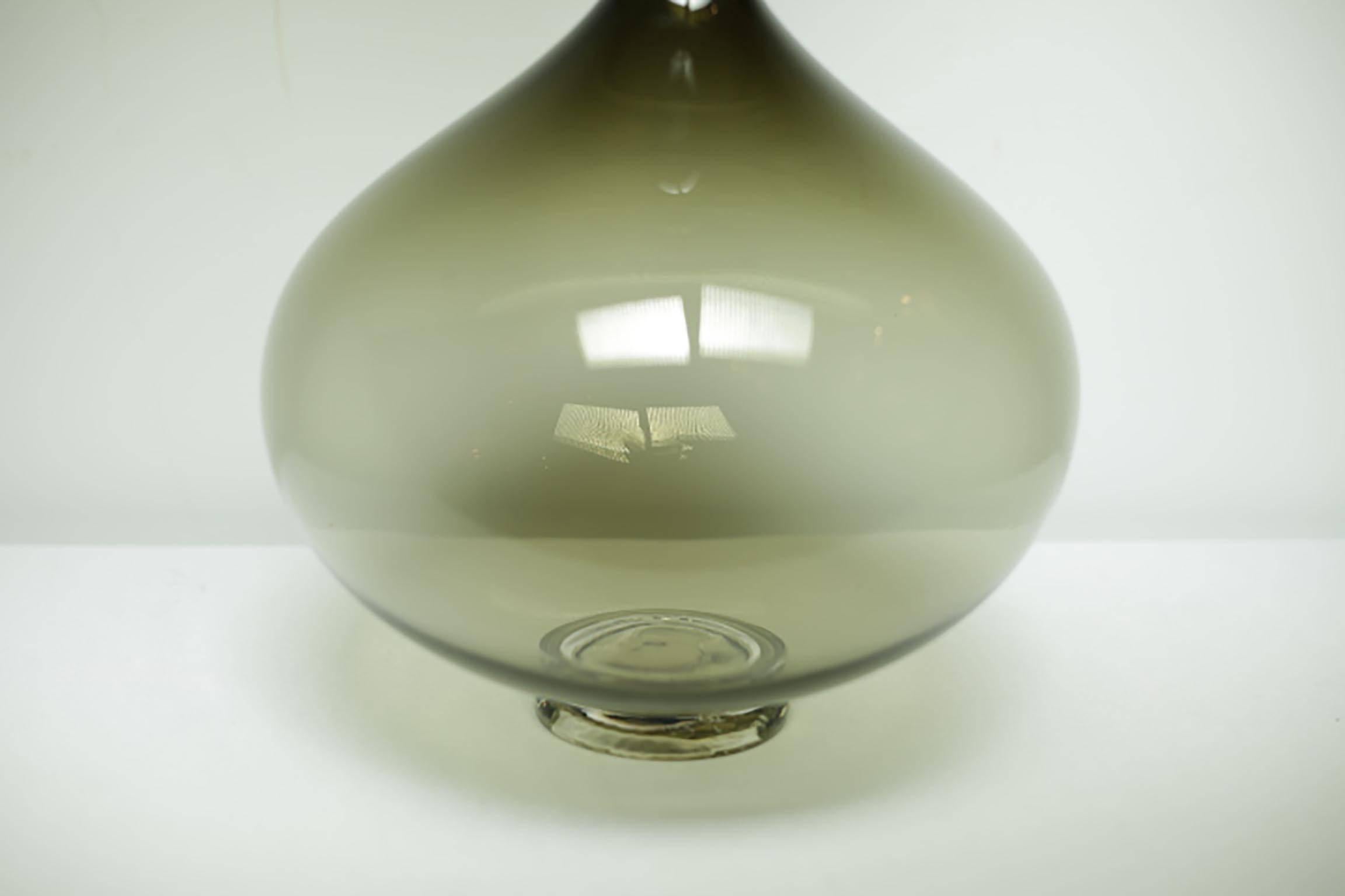 Large handblown glass decanter in smoke with round top designed by L.A. based Joe Cariati.