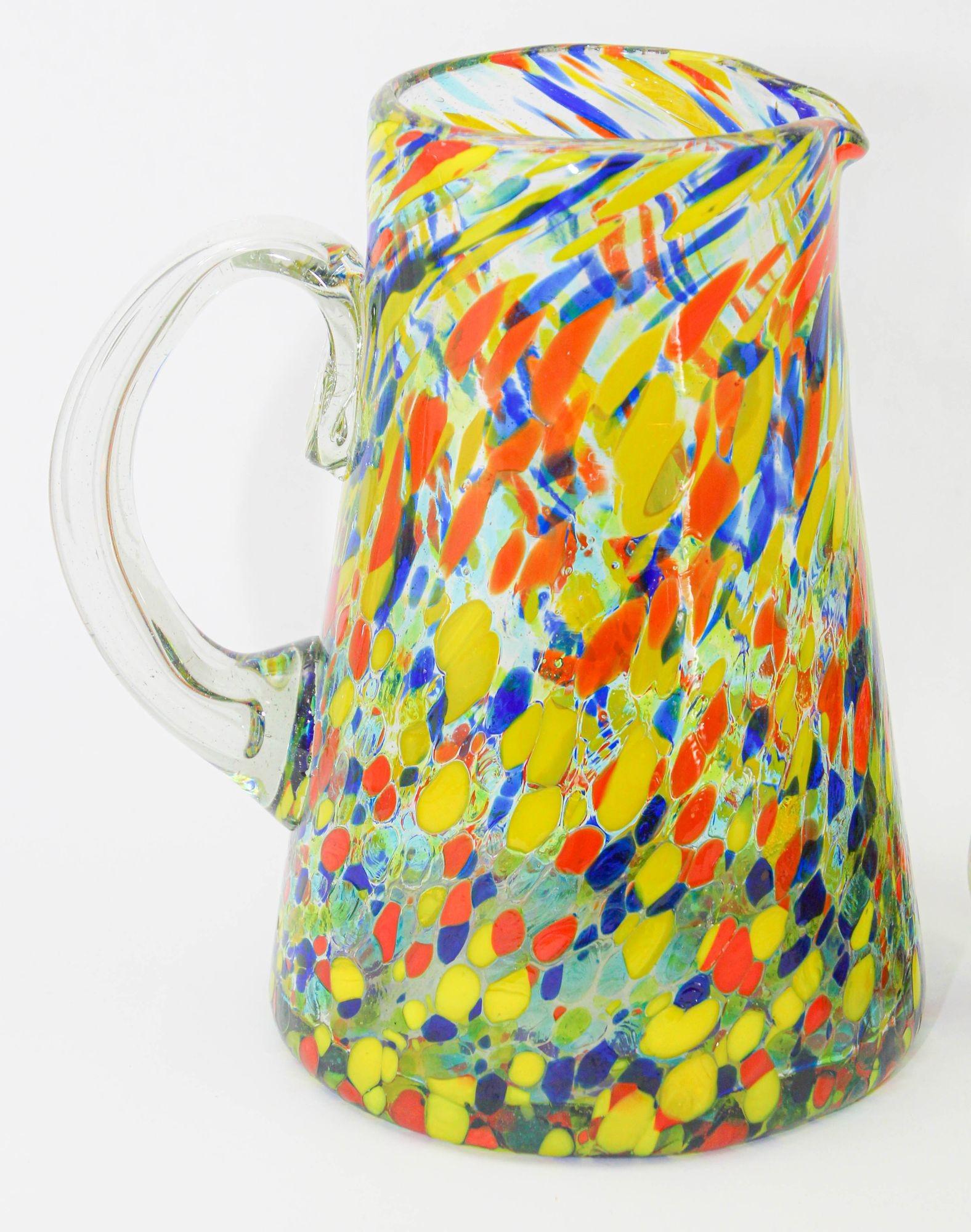 Hand Blown Multicolor Italian Murano Style Art Glass Jug Pitcher and Glasses.
Post Modern Pitcher and Glasses Set of Colorful Art Glass.
The set of three glasses and pitcher are hand blown with colorful different design, each one is unique.
Hand