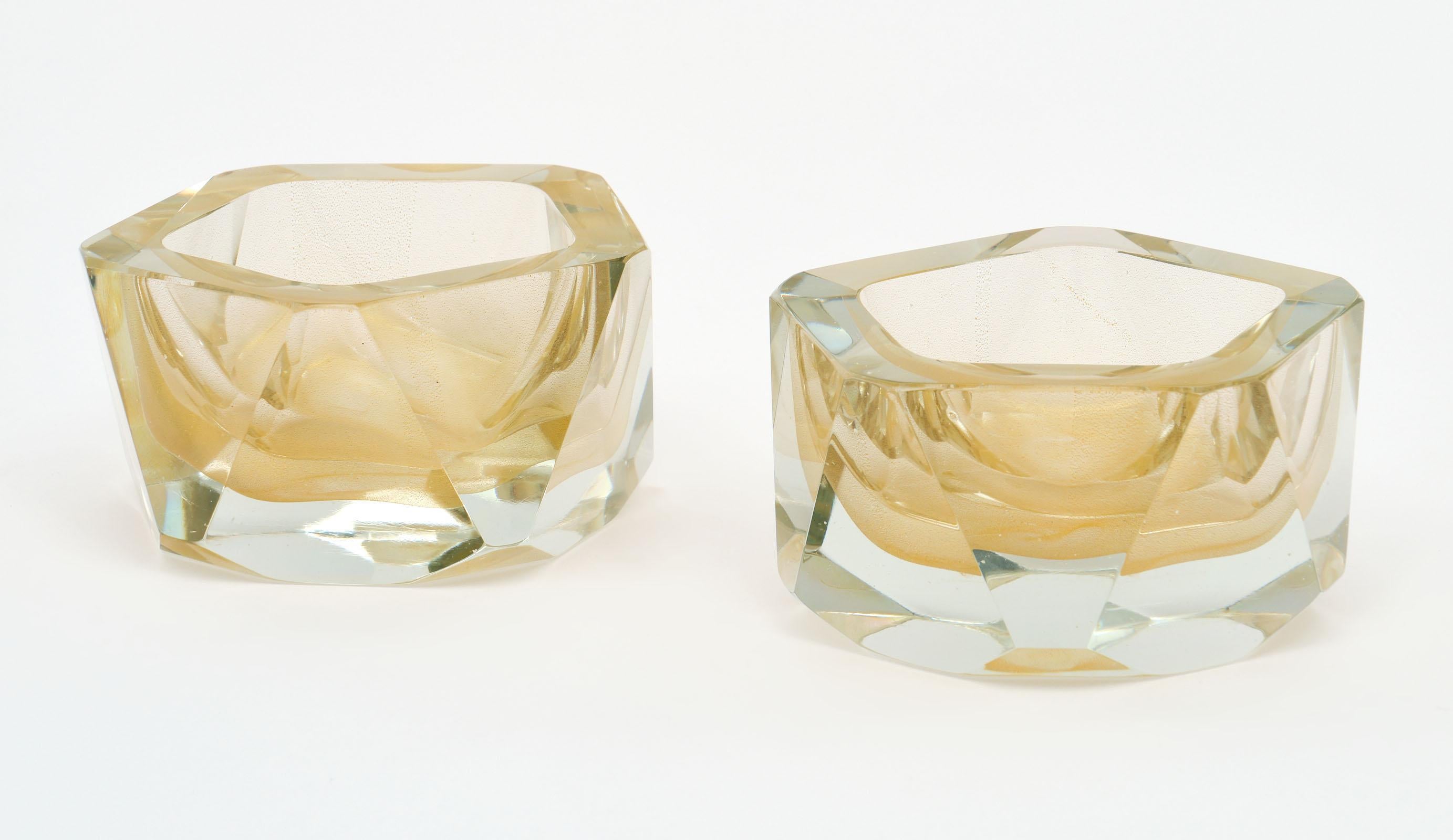 A pair of Murano glass hand blown avventurina bowls made and signed by glass maestro Alberto Dona. The avventurina technique is characterized by the hues of 23 carat gold dust added to the glass while it is in fusion (the adventure of gold through