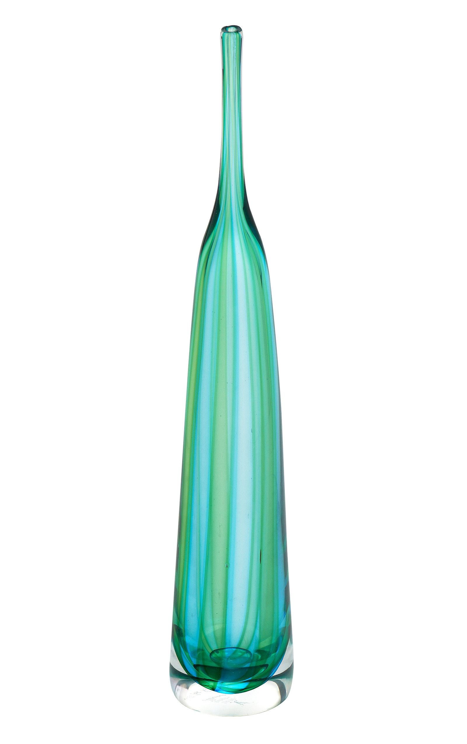 Hand-blown Murano glass pair of vases. This dynamic Murano vessel pair combines swirling shades of aqua and green glass. We love the shapes and beautiful; unique details.

The measurements listed are for the tall vase. The small vase is 9.5” in