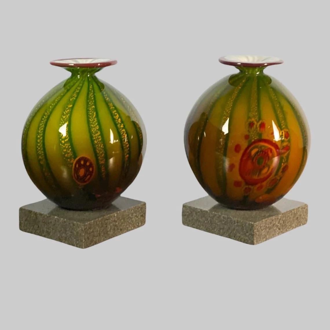 Luxurious rare old paired Murano glass vases on original stand made of marble.

Murano Glass made according to ancient technologies that arose on the island of Murano, near Venice. Italy, 20th century.

A rare author's work.

Extraordinarily