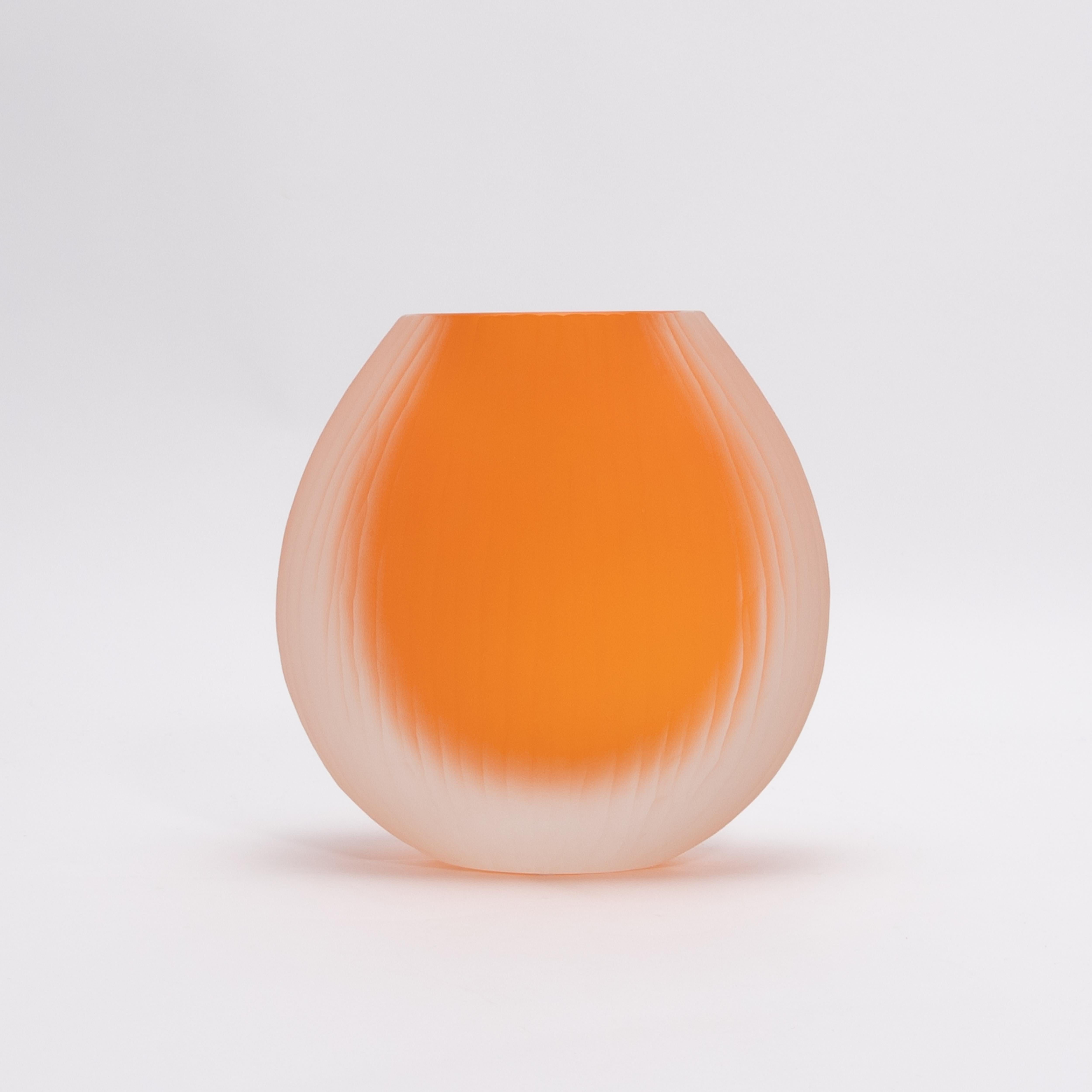The Supreme Vase, hand-blown in Murano, Italy, is an exquisite celebration of Venetian glass artistry. Crafted using frosted glass, this sculptural piece exudes an ethereal quality, with a velvety matte texture that enhances its contemporary