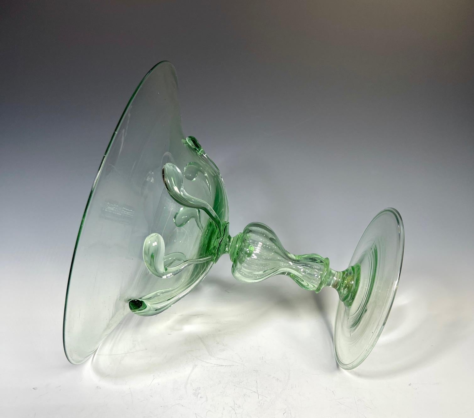 This is the perfect centerpiece that balances beauty, practicality and size. Hand blown Venetian/Murano moss green with a wonderful combination of design and elegance without it being 