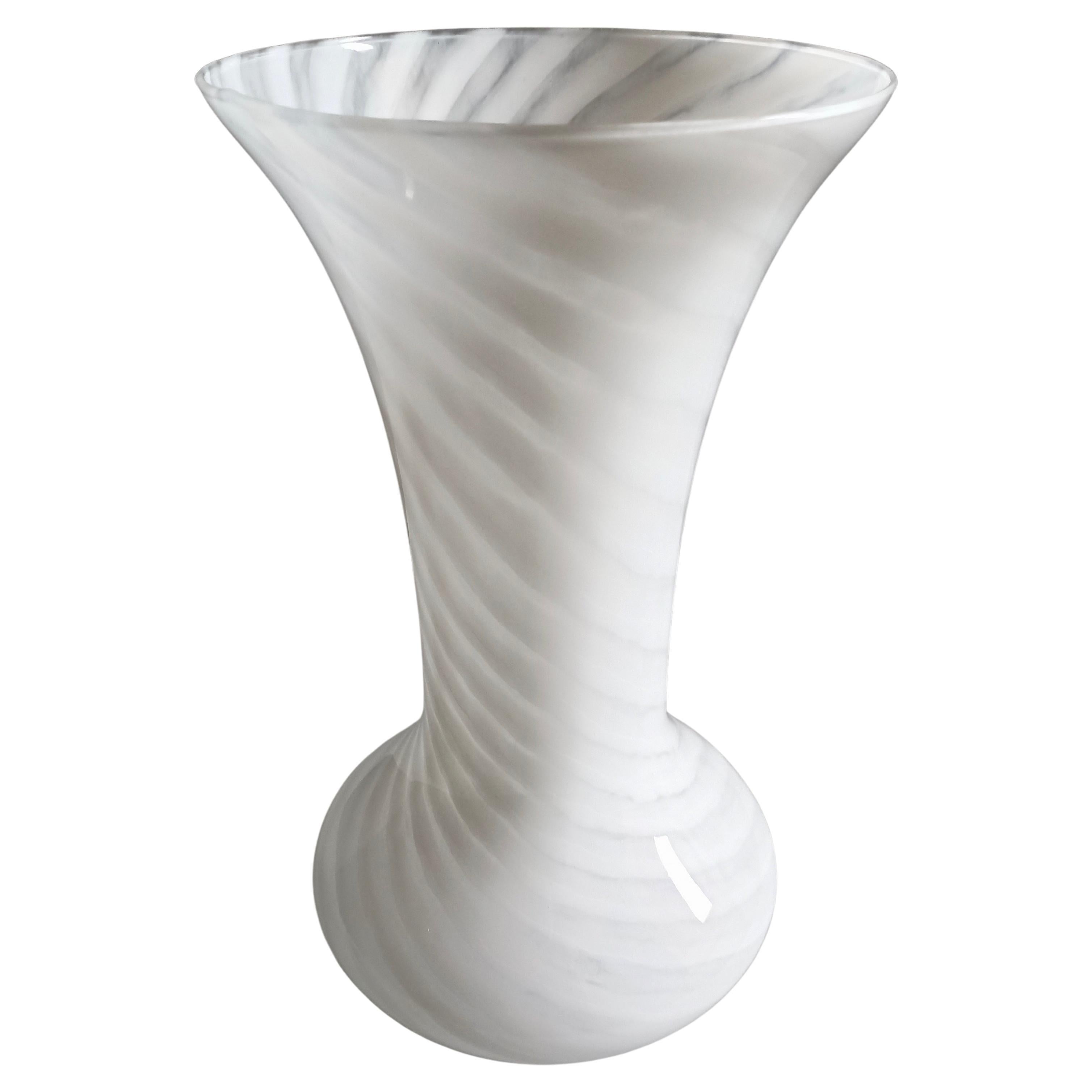 Large 1960s hand-blown swirled glass vase, clear glass base.  
Dimensions:
height: 37.5 cm/ 14.80 in
upper diameter: 19.5 cm/ 7.68 in
max. bottom diameter: 19 cm/ 7.48 in
weight: 1.9 kg
When shipping, we carefully protect your purchases, with the