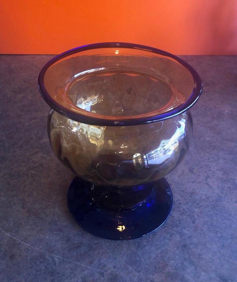 Hand blown two-tone (blue / gold) art glass vase by Blenko Glass, circa 1990s. A large beautiful example of American art glass.