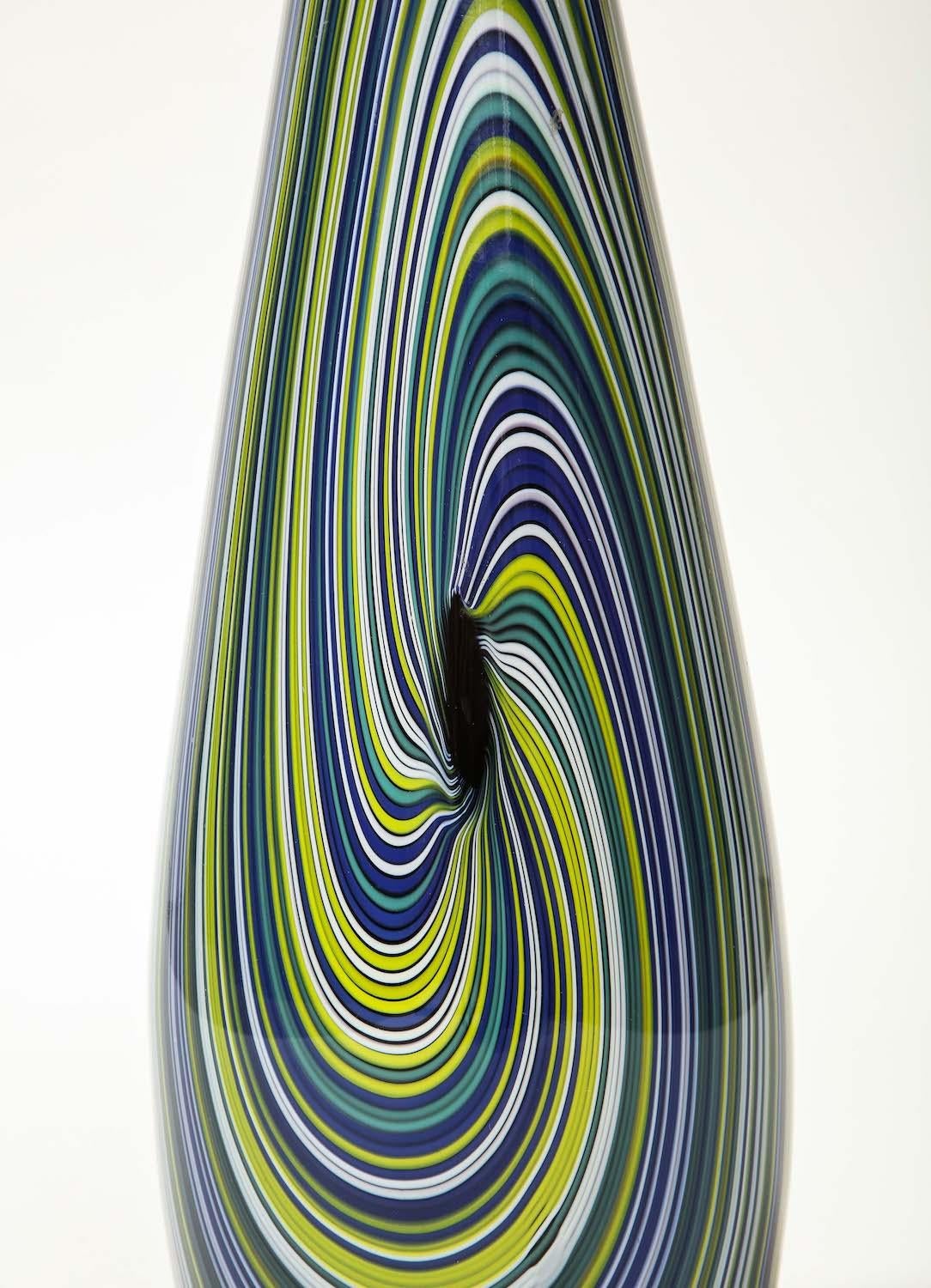 Multi-colored mezza filigrana glass. Signed and numbered underneath. Made in Murano.