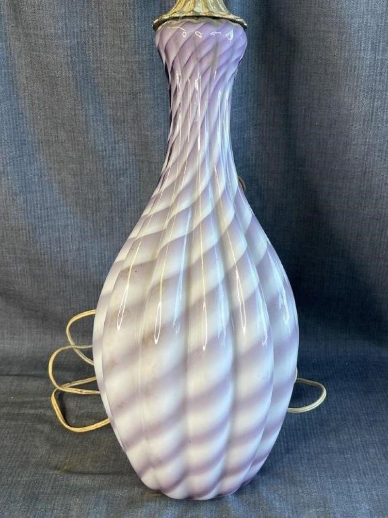 Hand Blown Vintage Murano Purple Swirl Pendant Light. Chain may be placed at different lengths depending on user. Measures approx 27.5h x 8 diam
