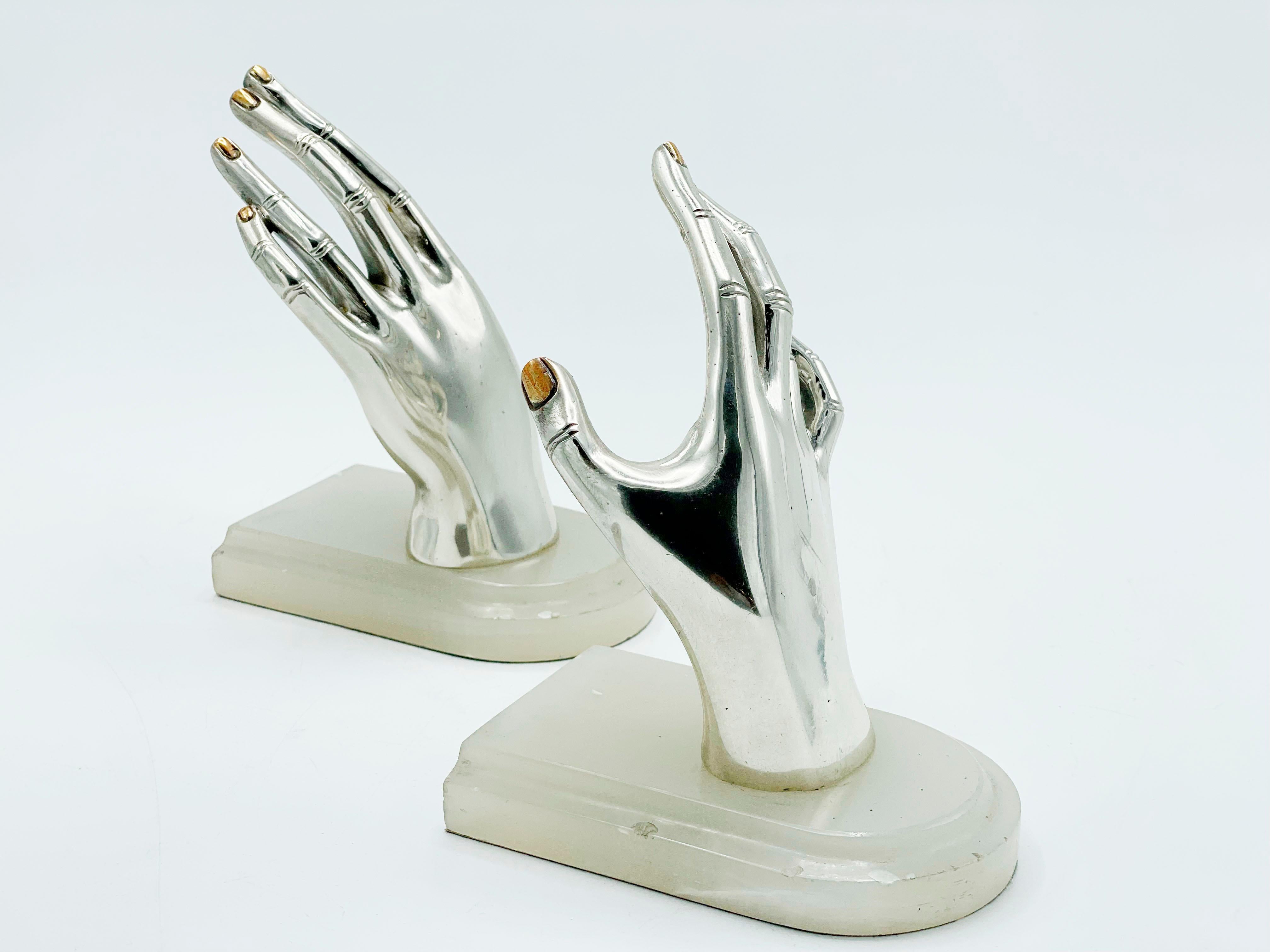 Metalwork Hand Book Squeeze in two colors with marble base 20th Century For Sale