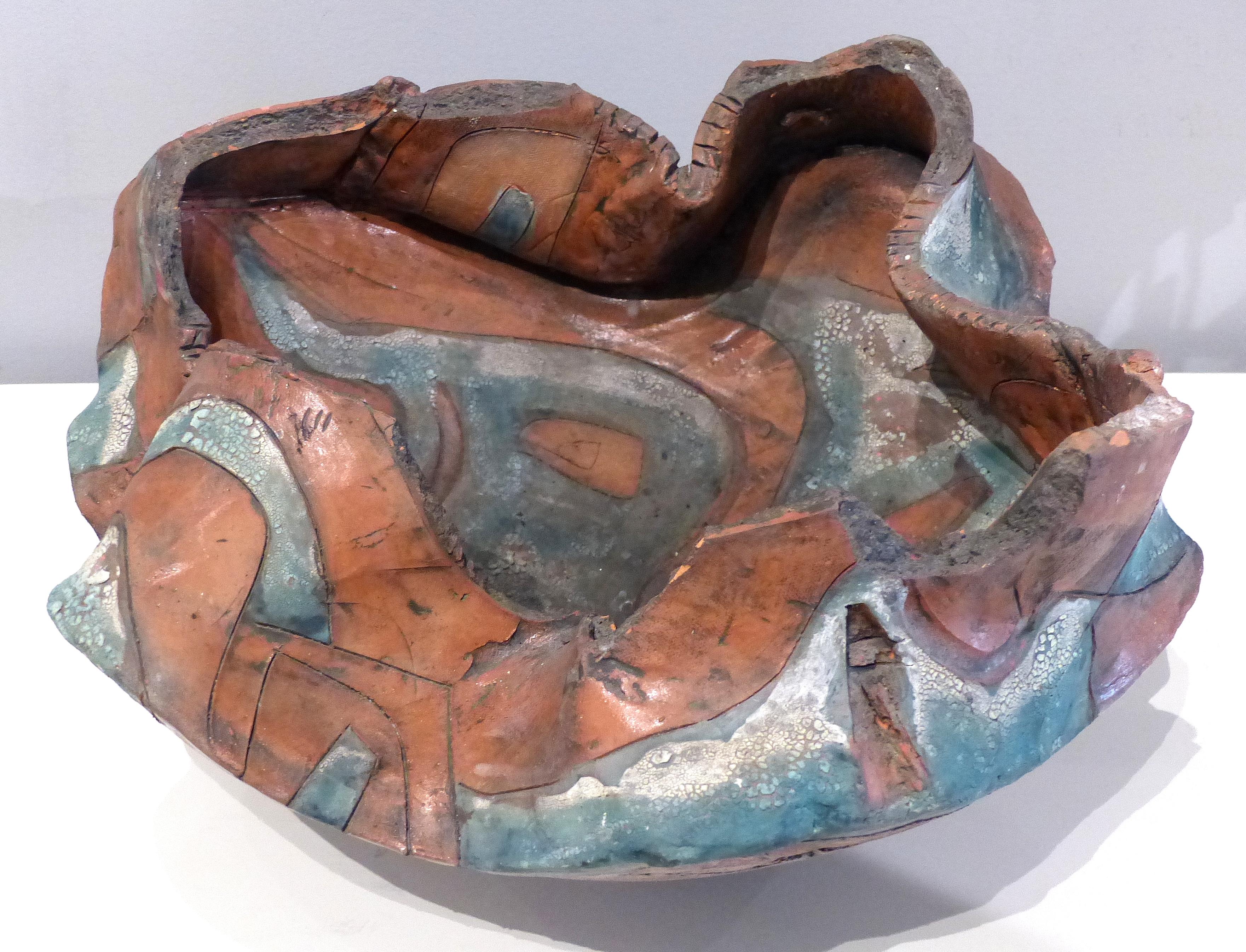 Brutalist Biomorphic Ceramic Pottery Vessel Sculpture, Hand-Built

Offered for sale is a large stunning Brutalist Studio Pottery vessel form sculpture. This biomorphic shaped sculpture has great textures, movement and rich colors. The work is signed