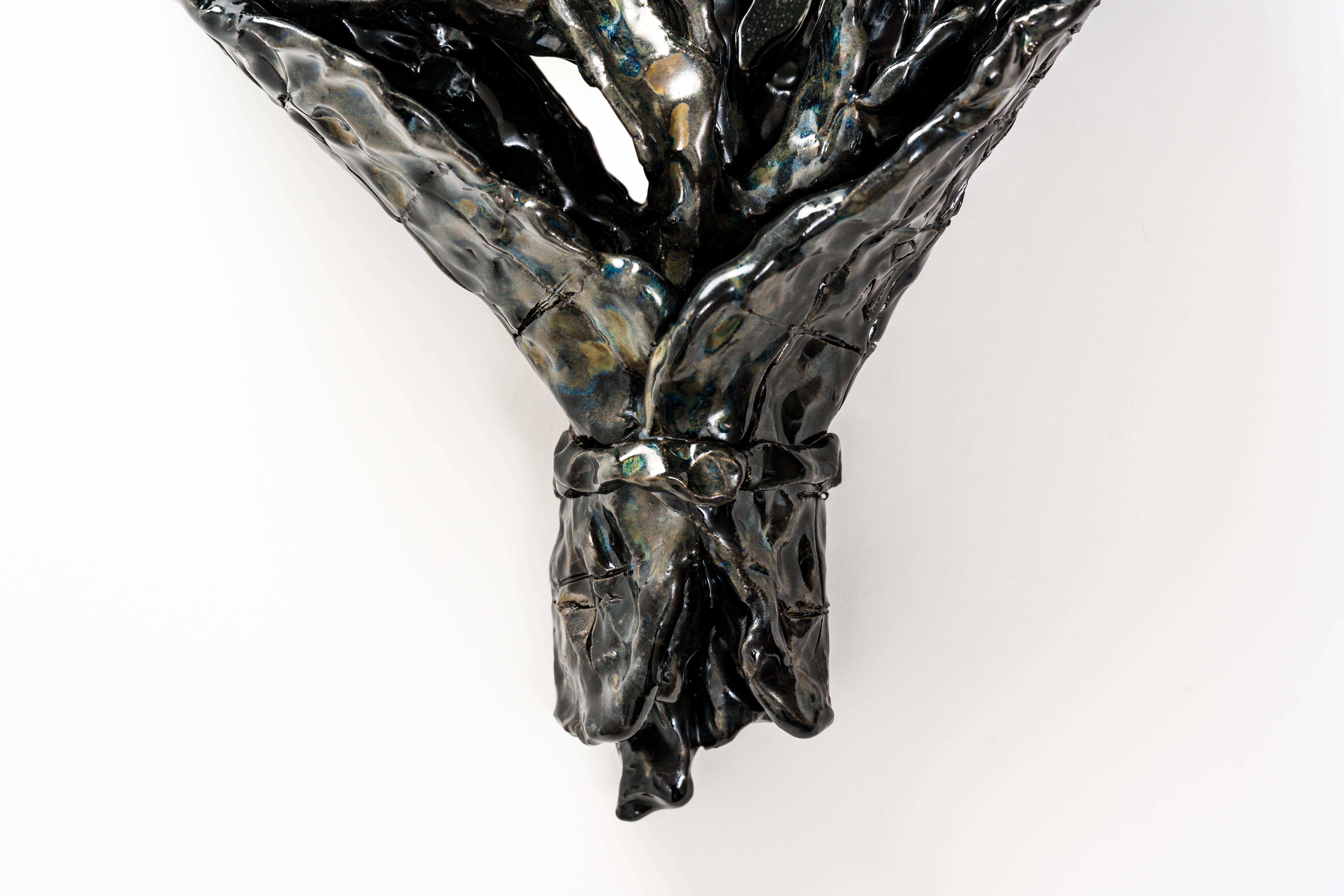 One-of-a-kind hand-built glazed ceramic decorative wall mirror, 'Moonlight (Black)' by contemporary ceramicist and artist Jaye Kim. 

This surrealistic wall mirror is sculpted in the form of a bouquet of flowers against a mirror, which provides