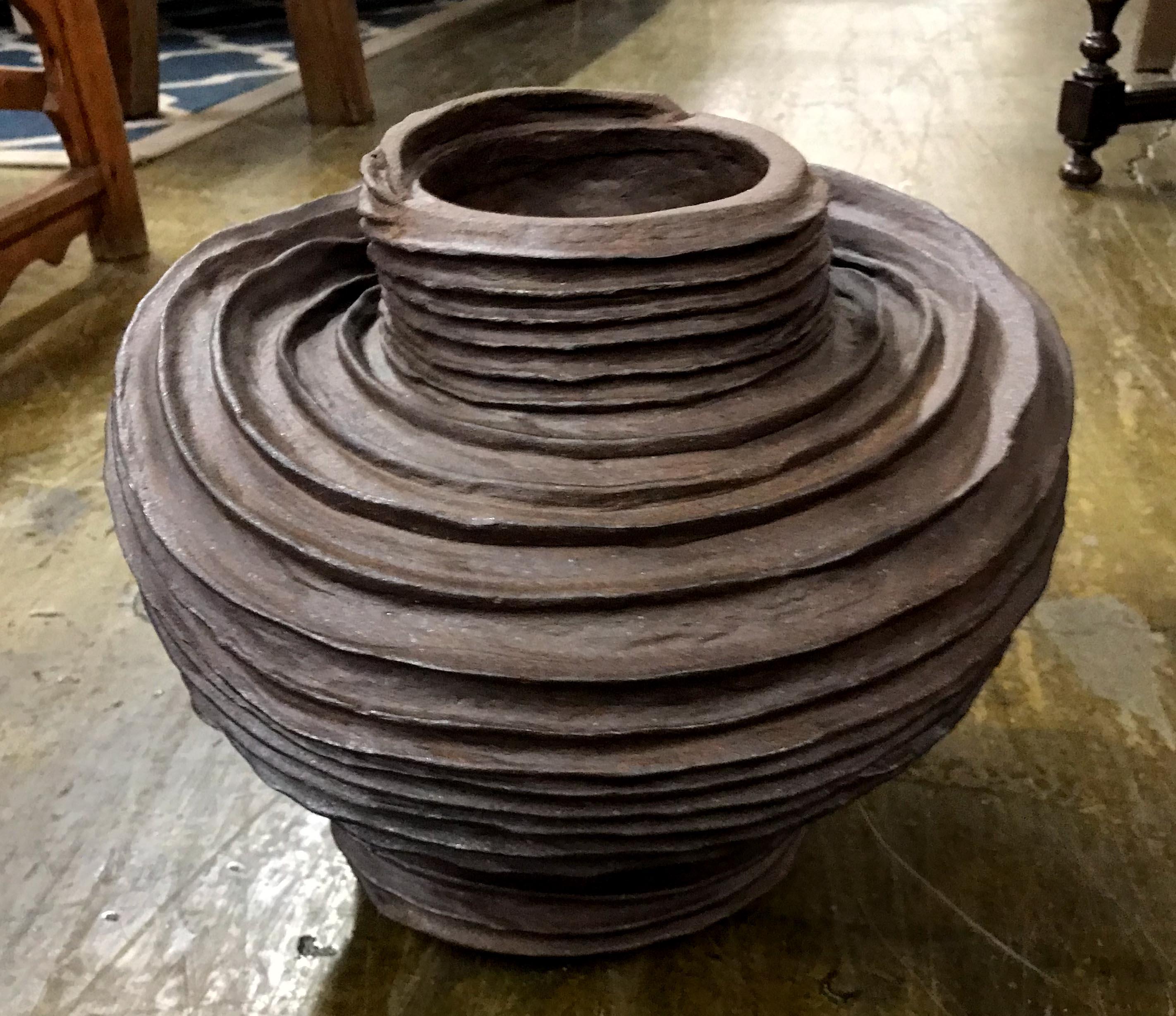 Hand built ridge ceramic bowl or vase. Dark iron rich clay. High fire. Cone 10.
Made by Santa Barbara based artist Sally Terrell.