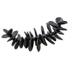 Handbuilt Ceramic Sculpture in Shiny Black Glaze, Skeletal and Undulating