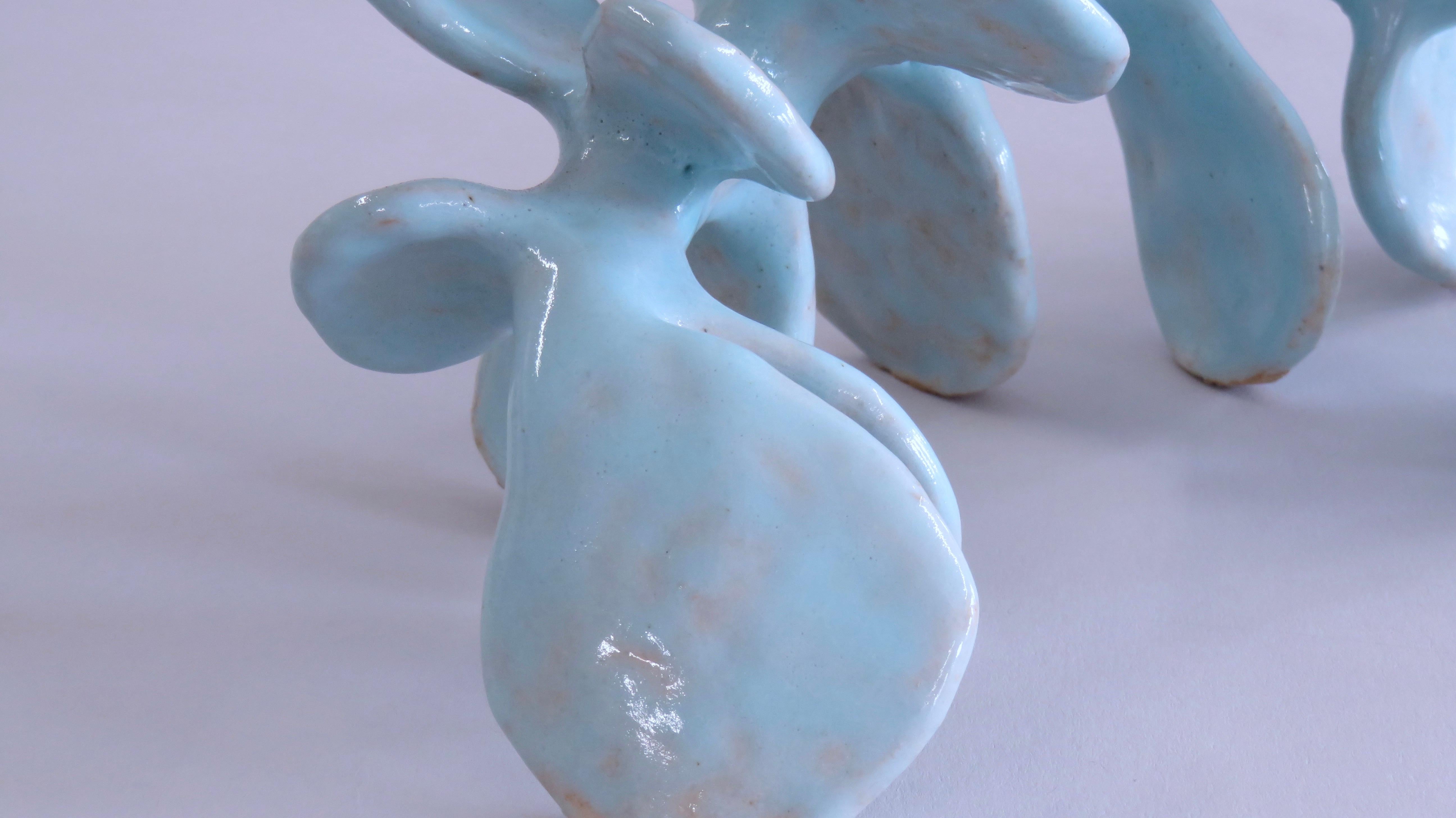 North American Hand Built Ceramic Sculpture, a Skeletal Vertebral Form Glazed in Turquoise