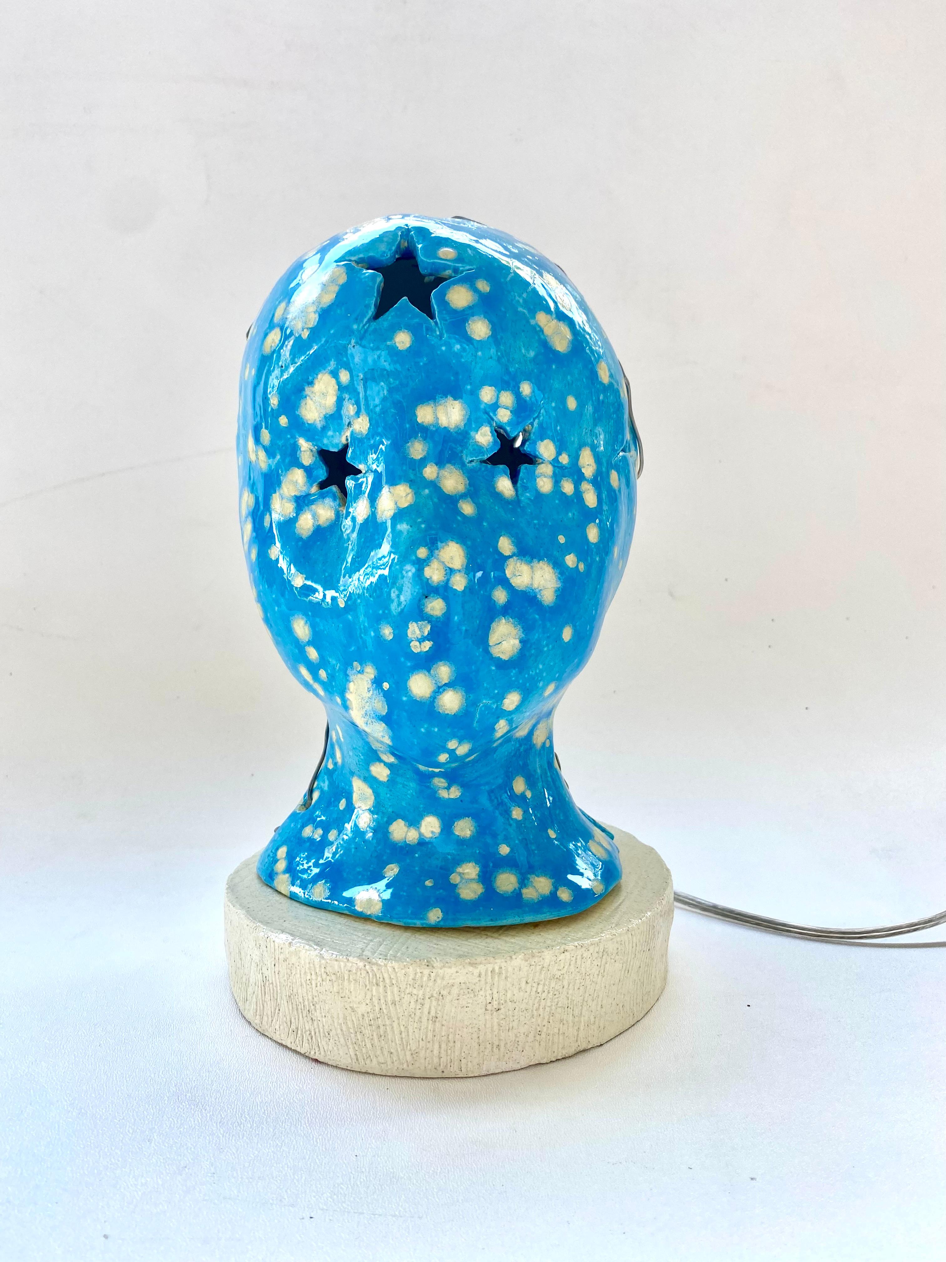 Hand Built Glazed Ceramic Night Lamp

Offered for sale is a handmade functional art ceramic night lamp that is signed and dated by Rexx Fischer. Rexx is a painter and ceramicist. He is the son of the artist Warren Fischer. 
