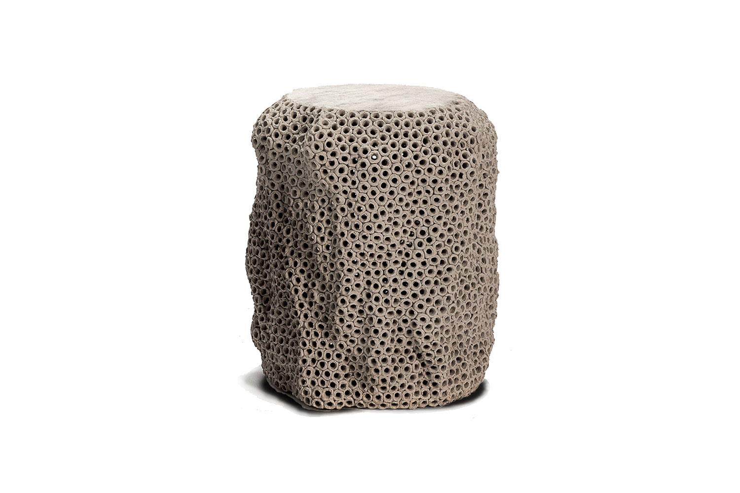 Inspired by nature pierced ceramic side tables by Gilles Caffier

These organic and functional hand built ceramic side tables have a hide top detail. Earthenware base finish in linen color.

Renowned for his unique & limited edition pieces,