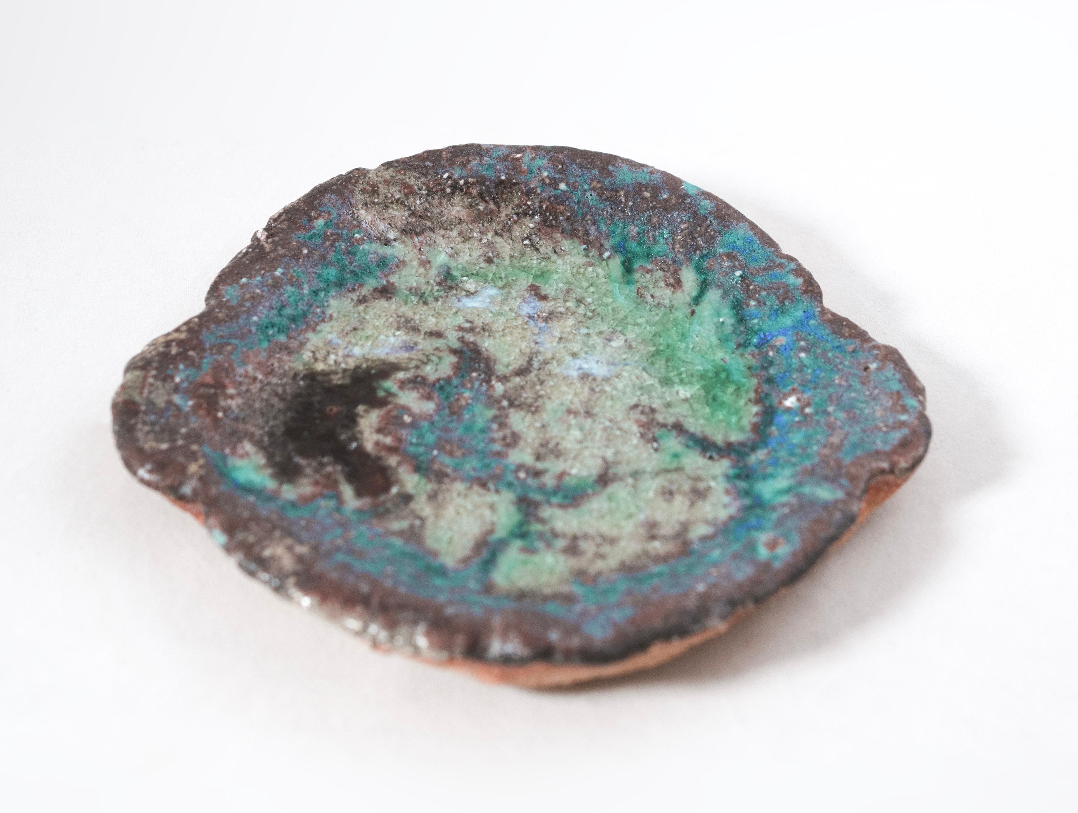 Plate made with local clay from Shigaraki, one of the six ancient kiln sites in Japan. Shigaraki is known for the special qualities of their clay. This sandy clay comes from the bed of Lake Biwa which is over 4 million years old. These rustic