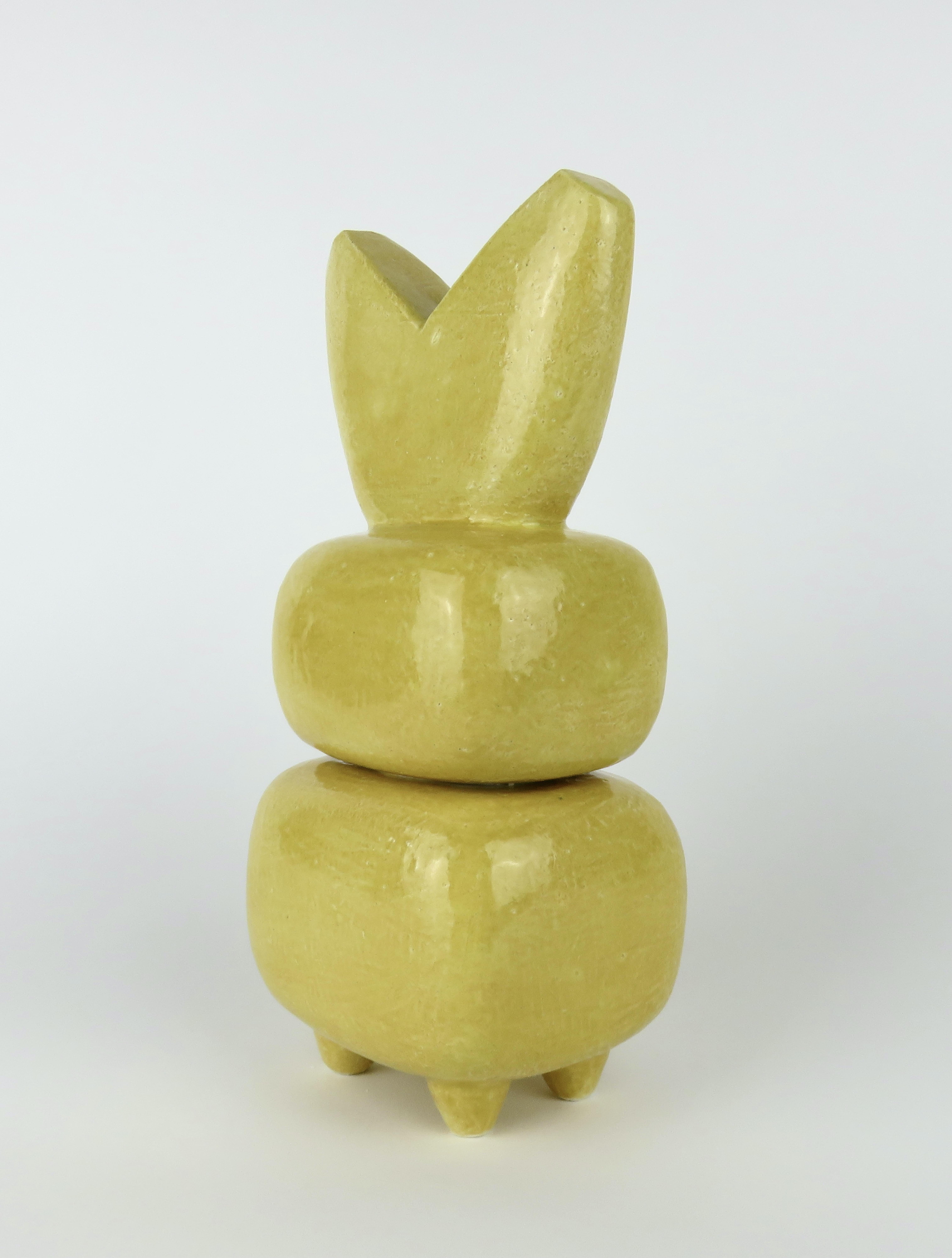 Brand new and hot out of the Kiln, this lovely straw-yellow Modern TOTEM is made of white stoneware with a light glaze application. The textures on the handbuilt forms show through the glaze. Each form or part is first made as a solid piece, then