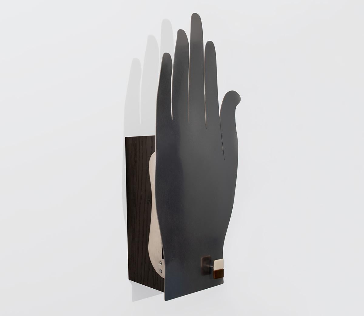 The Hand cabinet is like a hand you see in a dream, exaggerated but familiar. Inspired by Surrealism, The Hand cabinet it is meant to hold your most cherished items. ​​Custom sizes, shelves, and wood species available upon request; hardware is