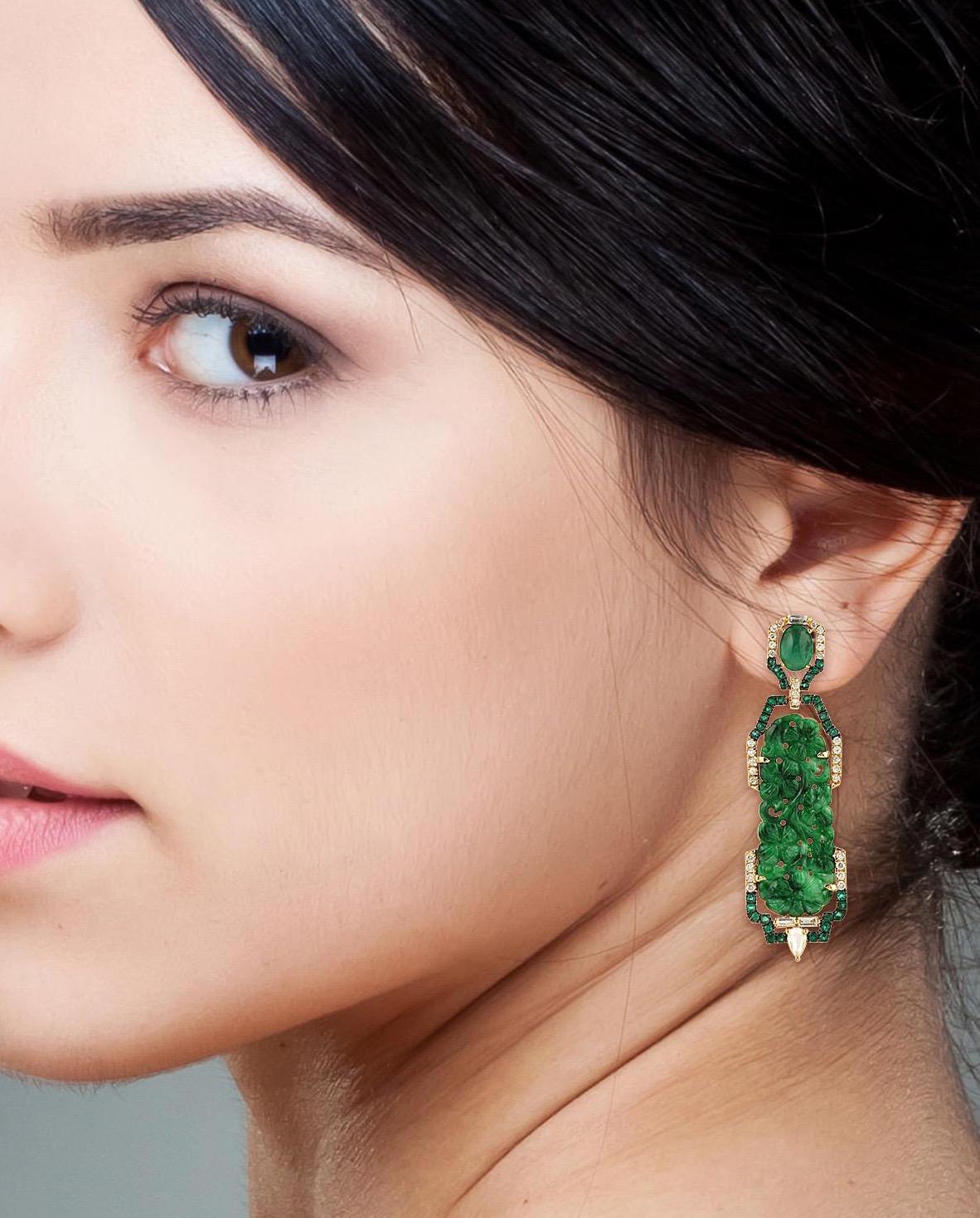 These stunning hand carved Jade earrings are thoughtfully and meticulously crafted in 18-karat gold. It is set in 18.35 carats of Jade, 2.62 carats emerald and 1.02-carats of glimmering diamonds.

FOLLOW  MEGHNA JEWELS storefront to view the latest