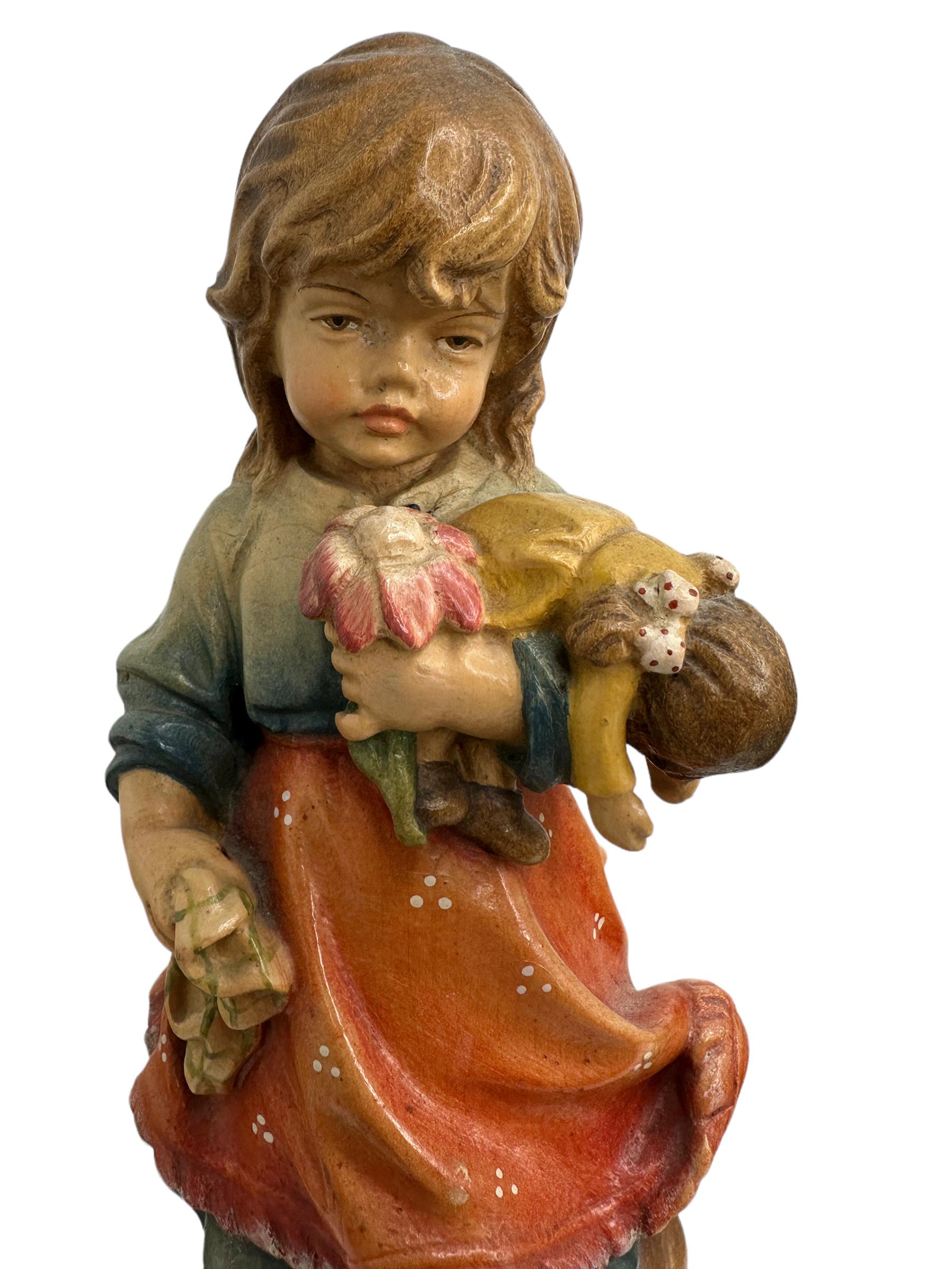 Hand-Carved Hand Carved 20th Century Wooden Girl with Doll and Cat Figure by ANRI, Italy For Sale