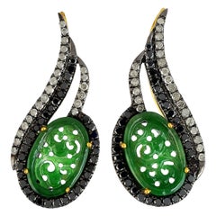 Boucles d'oreilles manchette en jade sculpté et diamants