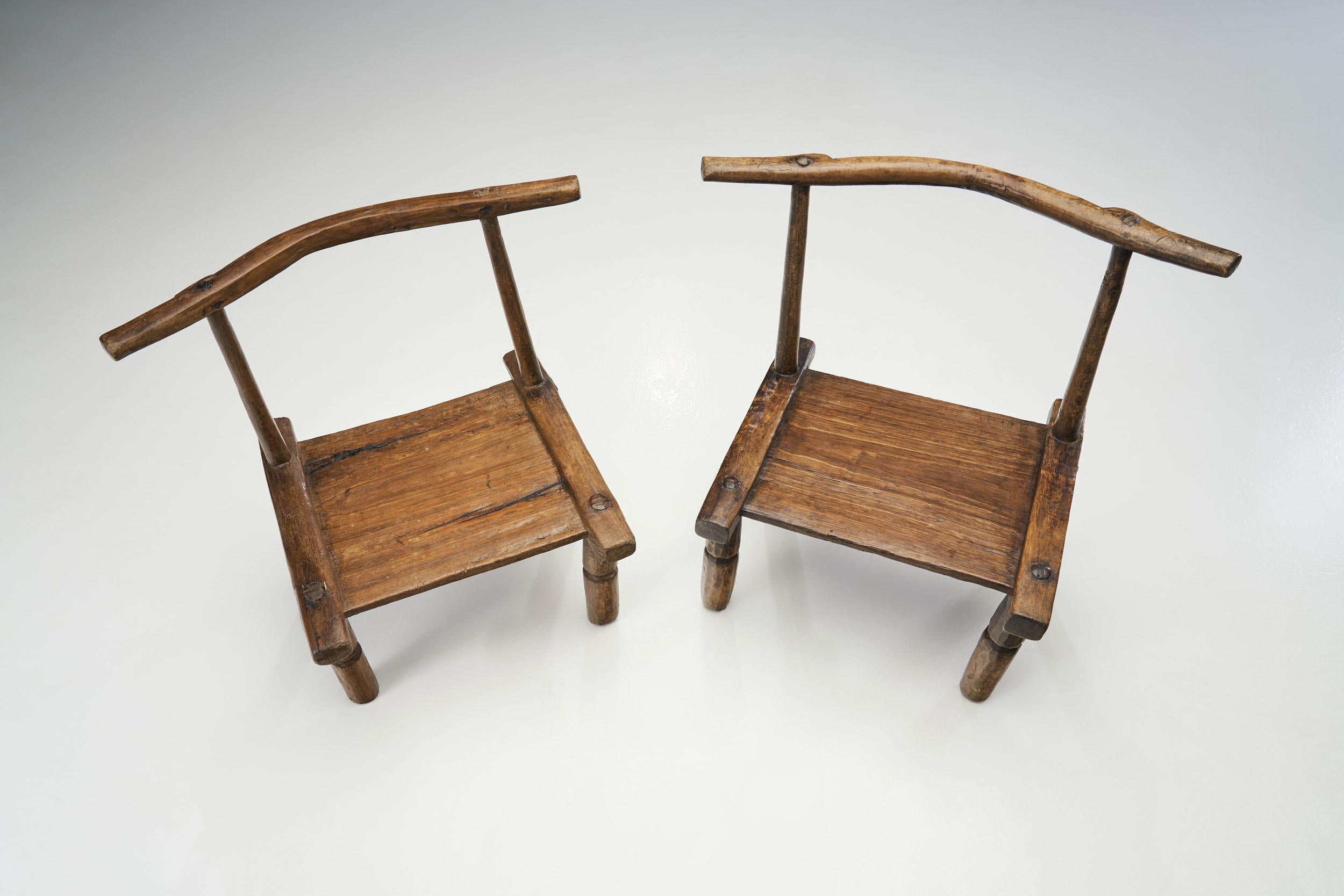 Hand-Carved Hand Carved African Baule Tribal Chairs, Ivory Coast, Early 20th century For Sale